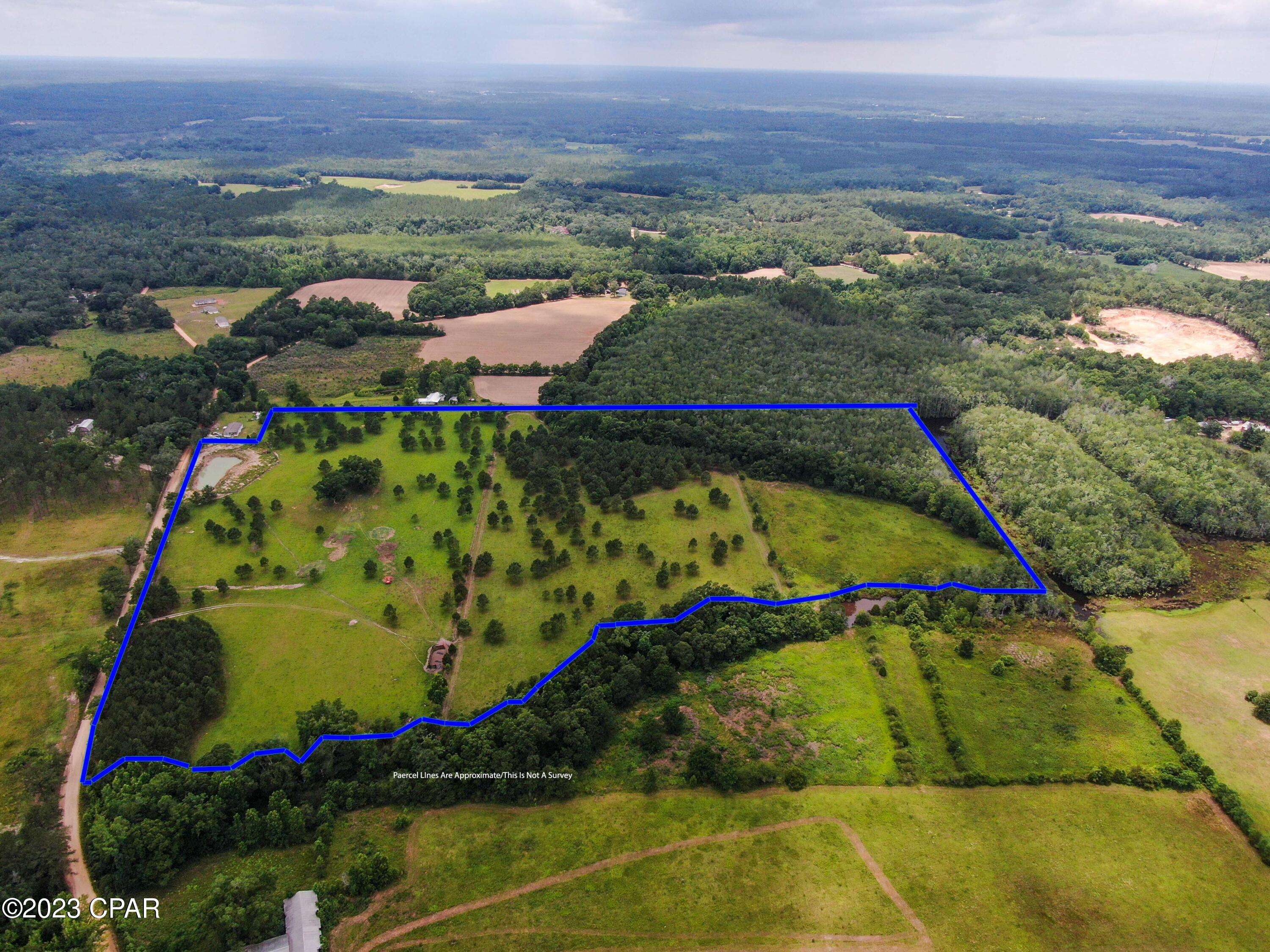 Gorgeous 41+/- rolling acres of pastureland and hardwoods! This property features cattle ready fencing, multiple water sources, and over 1300+/- feet of road frontage. This property is perfectly situated within a 45 minute drive to Dothan, AL, and less than an hour from Panama City Beach! Schedule your showing today!