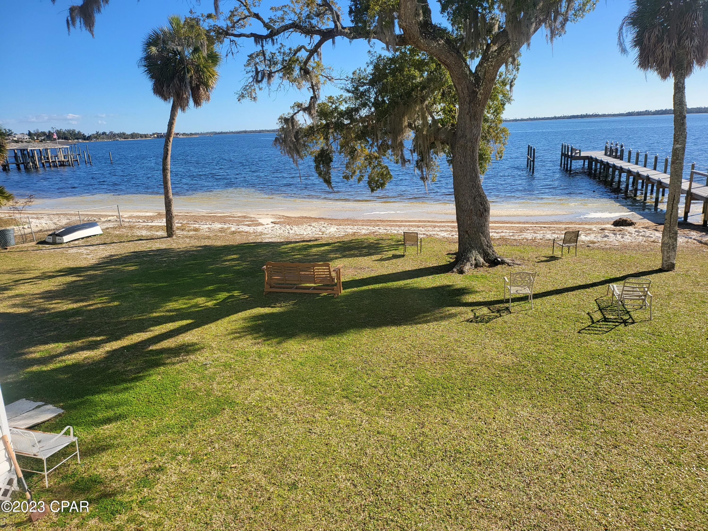 Listed under market for a quick sale.  Cove Condo Living. Here in a desired part of town. Close to Restaurants, shopping and a New Hotel. Walk across the street to your private beach, and dock. Inground gated private pool. Assigned parking. plenty of guest parking. HOA covers basic cable, water, on site maintenance staff, landscape.