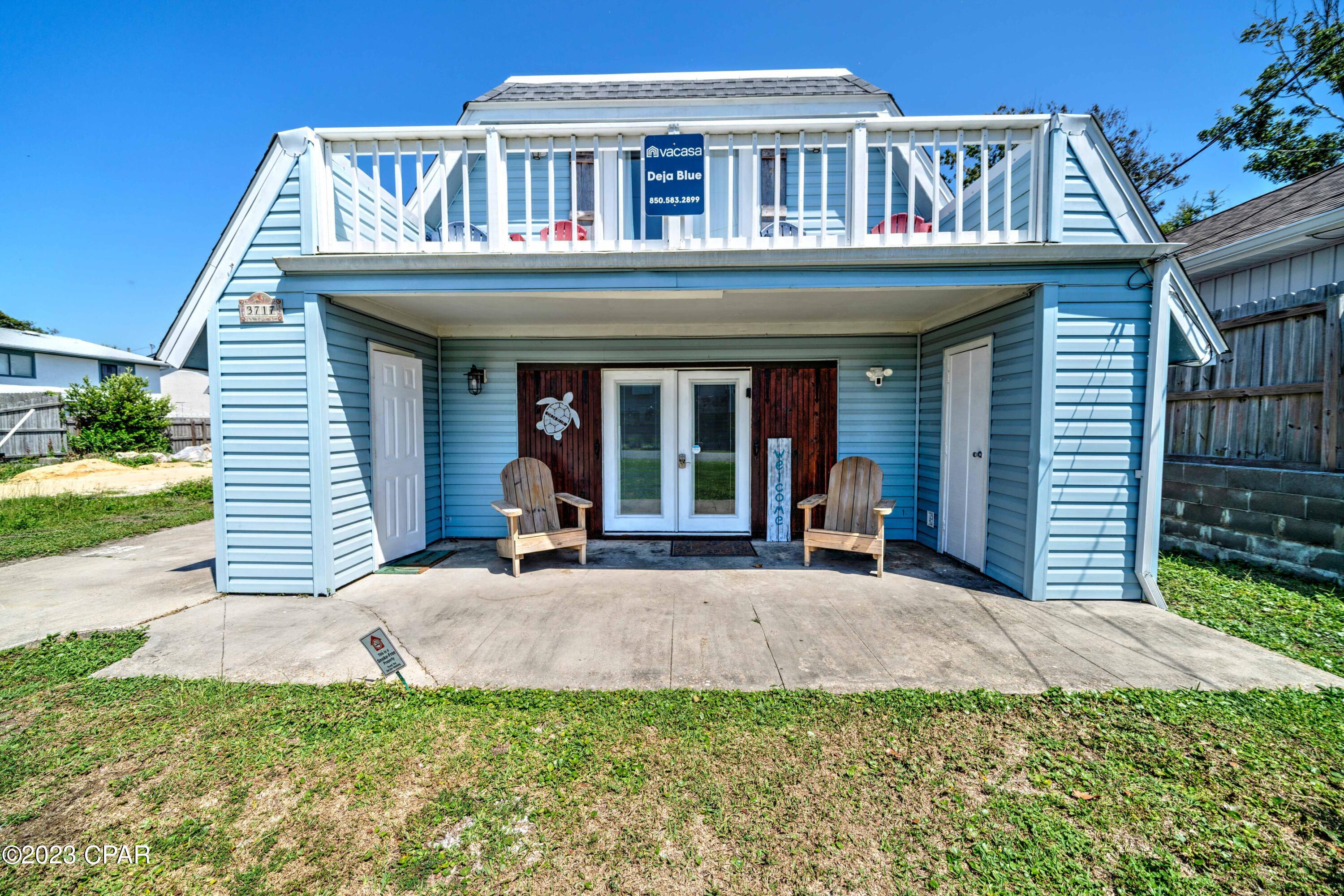 Drastic and I mean drastic price reduction to an amazing price!! Short term rental opportunity on a beach house with no HOA fees. Golf cart ride or a leisurely stroll to the Beach. WOW!! I should say no more!! Three bedroom home with primary bedroom on the main level with updated bathroom. Very spacious Living and Dining room combination adjoining and completely opened to the kitchen. Kitchen includes all of the appliances and look at all of the newer and impressive cabinets and granite counter tops! Notice the coolest laundry room. There is room for more sleeping quarters. Tiled floors on the main level and luxury vinyl planks upstairs. There are two additional bedrooms and nicely appointed bath and stand up shower upstairs. Don't you love the open walkway from the two bedroom upstairs and the light coming from the french doors from one of the bedrooms. And to cap it all off, there is an upstairs balcony from one of the bedrooms! You are so convenient to the boat ramp onto the Lagoon! Fenced backyard, single carport, and room to also park a boat or small RV! Very nices size backyard with privacy fence! Home sold partially furnished for seller wants a few pieces of furniture. Seller will be painting the pink trim back to white unless you want it like it is!! This home surely has it all!