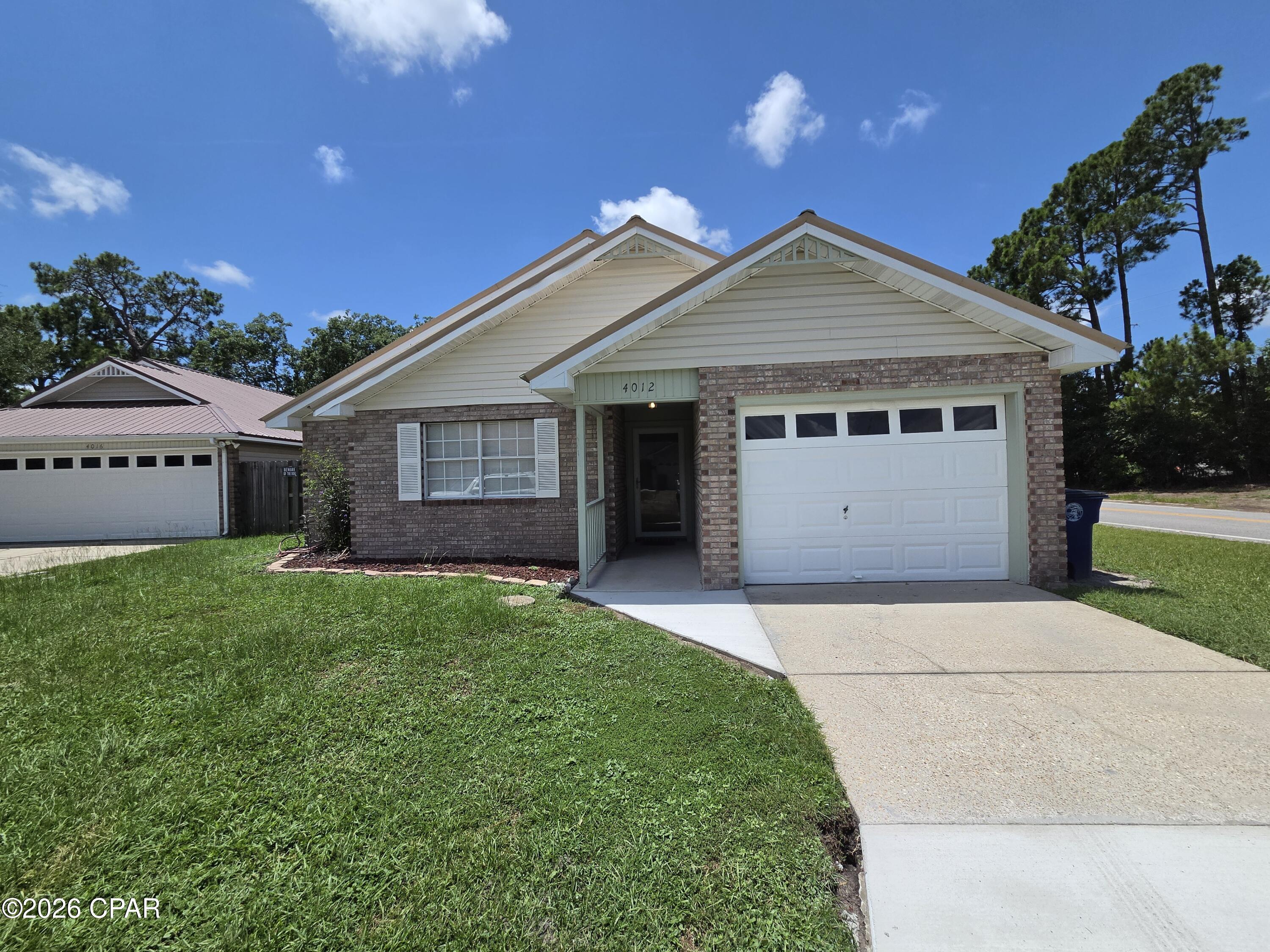 For Lease - Beautifully updated 3-bedroom, 2-bath home with a one-car garage, offering comfort and convenience in a central Panama City location. Interior upgrades include luxury vinyl plank flooring, new carpet, refreshed bathrooms, and a brand-new stainless-steel refrigerator.

The spacious primary bedroom easily accommodates a king-size suite and features an ensuite bath and a large walk-in closet. Enjoy a split-bedroom layout for added privacy. The living room offers a vaulted ceiling and a cozy fireplace, opening to the dining nook and kitchen. The kitchen is equipped with new granite countertops, abundant cabinet and counter space, and includes a refrigerator, stove/oven, and dishwasher. A dedicated laundry room is attached.

Two additional bedrooms share a well-appointed hall bath. Outdoor living is a highlight with a covered, screened patio, additional paver patio, and a fully fenced backyard--perfect for grilling, relaxing, and entertaining.

*No pets allowed.