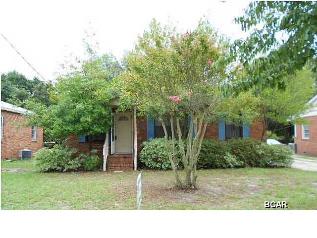 Very nice remodeled home with tile and laminate flooring throughout, new A/C unit, separate laundry room with washer and dryer, 1-car carport, fenced back yard, and 2 extra storage buildings.