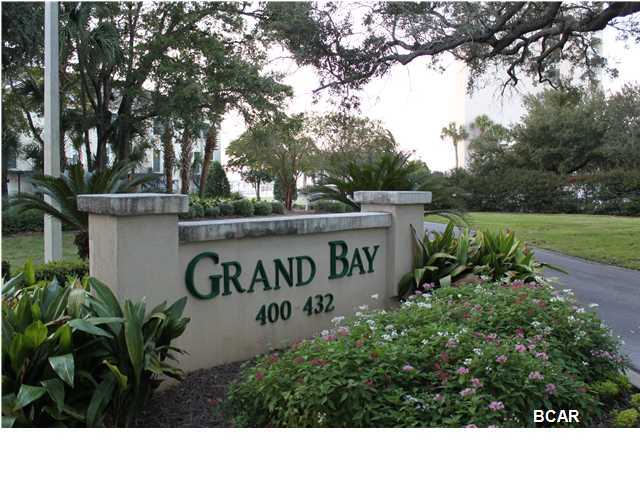 ******PRICE REDUCTION******* SELLER SAYS GET IT SOLD! Don't miss this opportunity to own Waterfront Property in the Beautiful and Historic Cove District! This 3-story Grand Bay Townhome is nestled away right off of the exclusive Beach Drive, overlooking the beautiful sunsets of St. Andrews Bay, and only steps away from the downtown shops and restaurants on Harrison Ave. Each of the two bedrooms has a private bath, with an additional 1/2 bath on the main floor. There is over 2100 sq ft under the roof, including a tandem garage with doors on the front and back for easy access to the Bay. Boat docks available right around the corner at the Panama City Marina for spontaneous boat trips to Shell Island or fishing. All info is approx and must be verified by buyers
