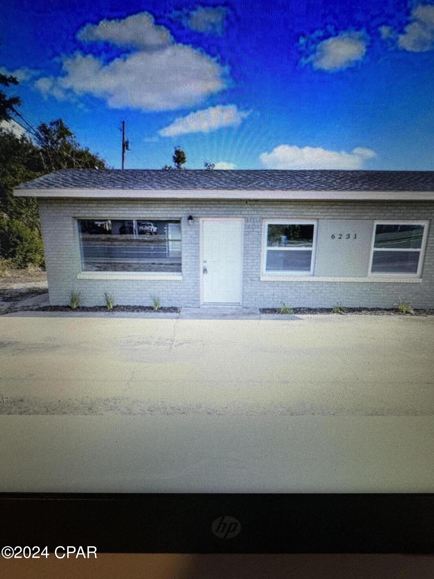 This is the front apartment/commercial building. Will rent either commercial or residential. All new inside ,new paint ,new flooring, new everything. Deposit same as rent. No pets allowed. If commercial it will be a 3 year lease and other rules apply.Call today.