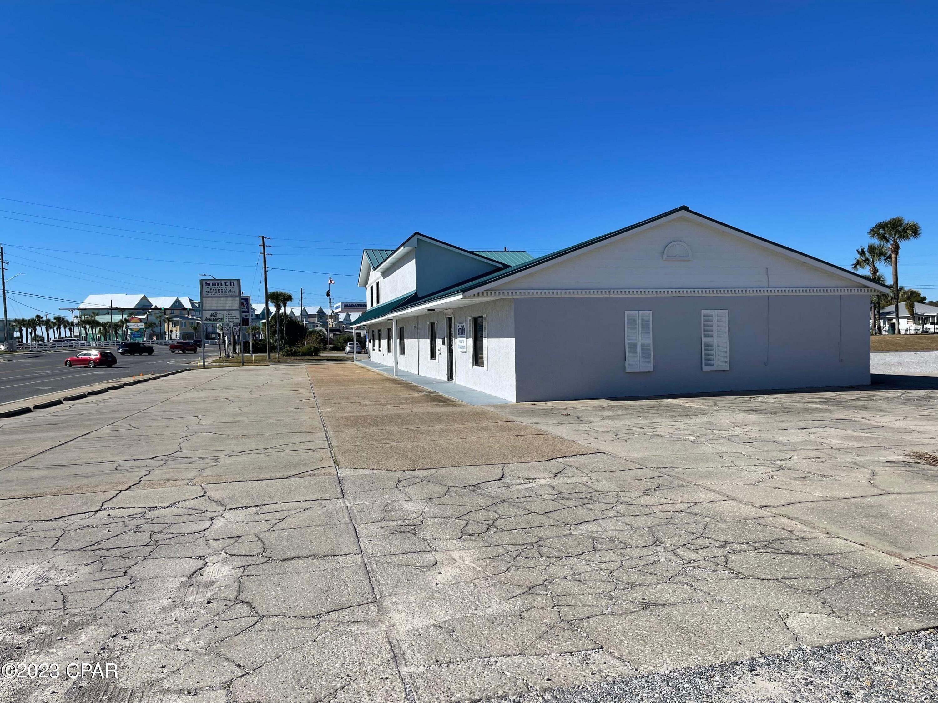 Great location for retail center or to develop, property is located right next to the New Margaritaville Resort on PCB.  Over 6500 Sq. Ft. of retail space along with 237 Foot of Hwy Frontage on Hutchison Blvd, just before the connection to Front Beach on the West end of PCB.  Current zoning is Commercial with a FBO-3 overlay.  Height restriction is 90'