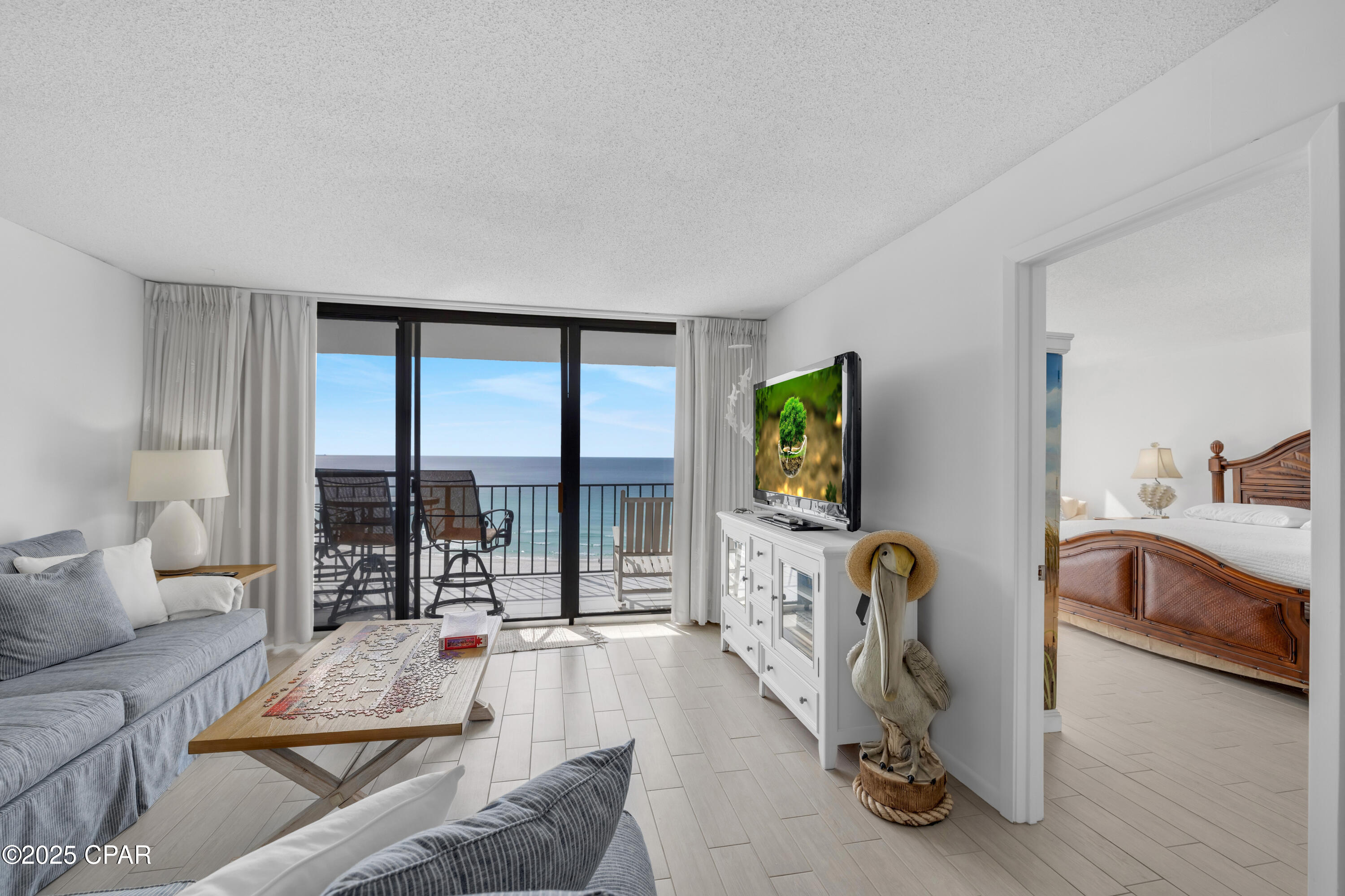 NEVER RENTED | GULF-FRONT PRIMARY SUITE | TOWER 1 LOCATION. This 11th-floor residence in Edgewater Beach Resort | Tower 1 | Panama City Beach, Florida has been privately owned and lightly used, reflecting consistent care throughout. Positioned on the Gulf side, the primary suite overlooks the resort's main pool and the Gulf beyond, with floor-to-ceiling windows that bring in abundant natural light. The Gulf-front primary suite includes a king-size bed, sitting area, double vanity, a spacious walk-in shower, and a walk-in closet. Fresh interior paint and tile flooring throughout support low-maintenance ownership and efficient turnover for vacation use. Notable updates include a new HVAC system installed in 2021 and a stackable washer and dryer, adding functional value within one of Panama City Beach's most established resort communities. 

Nearby recently opened attractions include Dolly Parton's Pirates Voyage Dinner & Show, Topgolf, and McGuire's Irish Pub, with Tootsie's Orchid Lounge scheduled to open in 2026, reinforcing the area's continued growth. 

Edgewater Beach and Golf Resort Complex is pet friendly and offers several amenities including FREE GOLF at a Par-3 executive 9-hole golf course plus full pro shop and equipment rental available. 11-Pools (all seasonally heated with the exception of the main pool), 6 reflecting ponds, 4 whirlpool spas and a Polynesian-style lagoon pool, which offers an open free-form surface area and elaborate system of waterfalls and islands within the pool itself, sun decks, beach access, restaurant, room service, salon, spa services, poolside bar, tram rides available to the beach, fitness center, tennis courts and pickleball courts. Over 5 dining options including private Gulf-front dining at Ocean's Bar and Grill, Starbucks Coffee Shop, Pizza shop, Blender's frozen drinks and Edgie's Corner Market Ocean's Bar & Grill that also offers ice cream shop, kids club features special events, splash pad, activities calendar. 
The 2026 HOA dues have decreased by 11.53% and are now $4,293.33/quarter.

All information is deemed reliable but not guaranteed; buyers should verify if important.