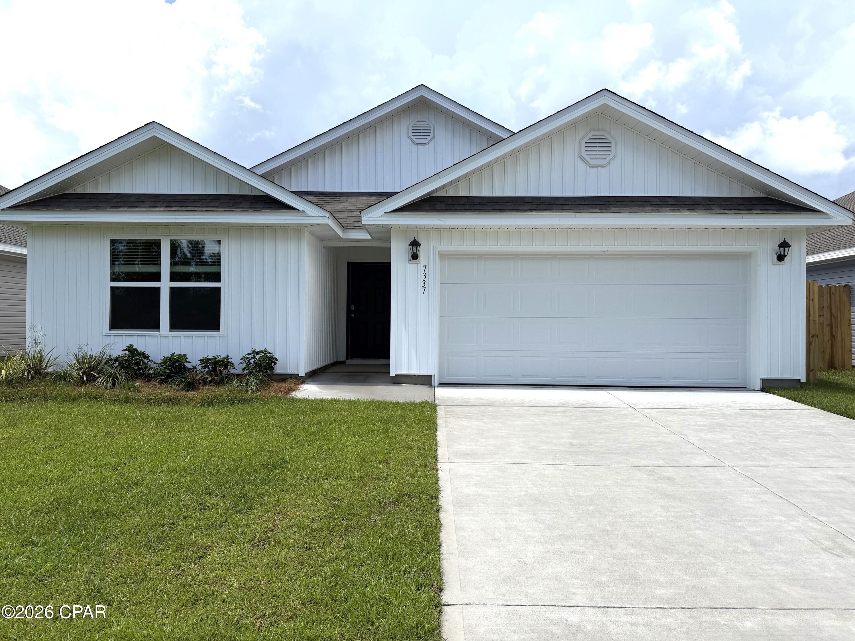 Welcome to the Ryder, a new home floor plan at Morningside in Panama City, Florida. The Ryder is a large open floor plan design complete with many features and space for you and your family. As you walk up to the home, you will be welcomed by the covered front porch and the spacious two-car garage. Around the house you will see durable vinyl siding all around, large yards at Morningside, and a large, spacious covered rear porch as well. Both porches have plenty of room for patio furniture to enjoy your day reading a book or watching those beautiful Florida sunsets.

As you walk inside the home, the guest bedrooms and guest bathroom with are located at the front of the home. Each bedroom comes with soft carpet floors and a spacious closet for clothing and storage. Further down the hallway is the garage and additional guest bedroom next to the laundry room. The hallway opens to the large open living room and kitchen leading to primary bedroom and backdoor. The kitchen has an island, a large pantry, and stainless-steel appliances. Next to it is the dining area with a double window next to the back door looking out into your covered rear patio and large back yard. The bathrooms and kitchen have beautiful white cabinets and granite countertops for modern style and durability. The large primary bedroom has soft carpet floors and plenty of space for a king size bed and furniture since the closet is in the primary bathroom. In the primary bathroom you will see beautiful EVP flooring and a double vanity with granite countertops as well as a walk-in shower.

The Ryder floor plan is a popular choice at Morningside. Schedule a showing to see it today!