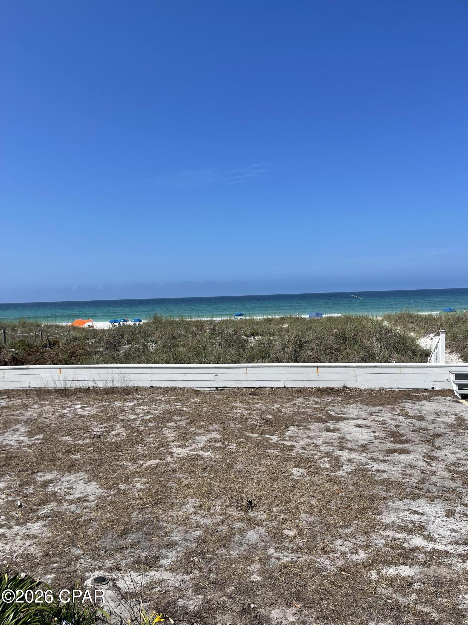 LARGE LOT ON THE GULF. 60 Feet directly on the Gulf. Most of the gulf front lots are 50 but this is 60 feet . This property is located next to 12 large homes built in the last few years. What makes this property special is that most of the new gulf front homes  built on Surf Drive are built on 45 of Gulf frontage, THIS PROPERTY HAS 60 FEET OF GULF FRONTAGE.
This is an original Florida beach cottage that has so much history and wonderful memories. It was one of the first to be built on Surf Drive. It can certainly be used as is but needs updating. 
Obviously, what makes this property so valuable is the fact that it is one of the largest gulf front lots in all of Panama City Beach. 
It is located on the east end of PCB on Surf Drive. Surf Drive is one of the most sought after locations as 12 large gulf front homes have been built next to this property in the last 5 years or so.
IT IS WITHIN WALKING DISTANCE OF THE NEW WORLD FAMOUS TOOTSIES. It is less than 10 minutes to all of the marinas on Navy Blvd. St Andrewes State Park is only 5 miles away. This property is close to many restaurants, entertainment venues and golf courses.