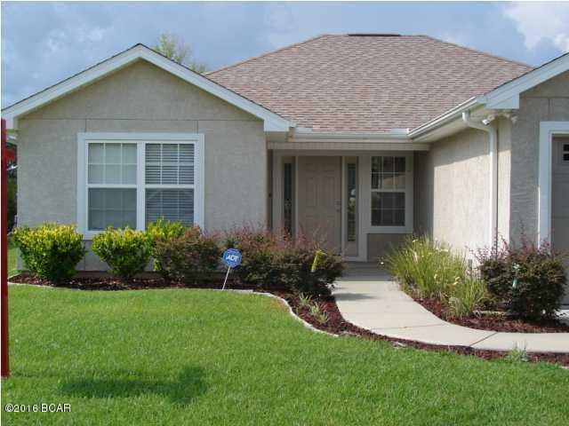 Single family home that features a fenced yard, stainless steel appliances, double vanity in master bathroom. 2 car garage, tile/hardwood floors and carpet in the bedrooms, breakfast bar in kitchen, sprinkler system for the yard and washer/dryer connections. Home is located conveniently to the Tyndall Air Force Base.