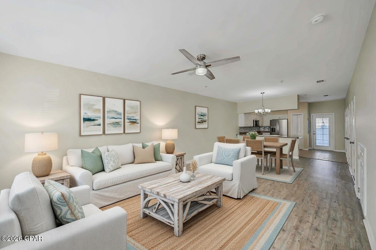 Welcome to Annabella's Townhomes, a beautifully maintained gated community that offers low-maintenance living along with exceptional amenities, including a community pool, fitness center, and inviting clubhouse. The main level of this spacious two-bedroom, two-and-a-half-bathroom townhouse features a bright, open floor plan that seamlessly integrates the living and dining areas, kitchen, a half bathroom, and laundry space. The large kitchen includes stainless steel appliances, a generous breakfast bar, a pantry, and an additional storage closet for exceptional organization. Step outside from the kitchen to a large back patio--perfect for morning coffee or casual gatherings with friends and family.
Upstairs, the expansive primary suite offers two closets and a private ensuite bathroom with dual vanities and a walk-in shower. The spacious secondary bedroom provides its own walk-in closet and a full ensuite bathroom. Annabella's Townhomes is ideally situated in a prime central location, with convenient access to shopping, dining, entertainment options, top-rated schools, and beautiful beaches.