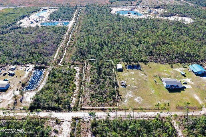 If you have always wanted  the peace and
 quite of the country and a place to plant your own garden, I have just what your looking for. Yet it's not to far from the beaches or town to do most of what you enjoy.
Golf course and fishing just a short distance away.
 Just the right place to build you new home on this 1.03 acres. You would have room for all your toys, boats, RV and more. Close to Tyndall Airforce Base. Call for details.
