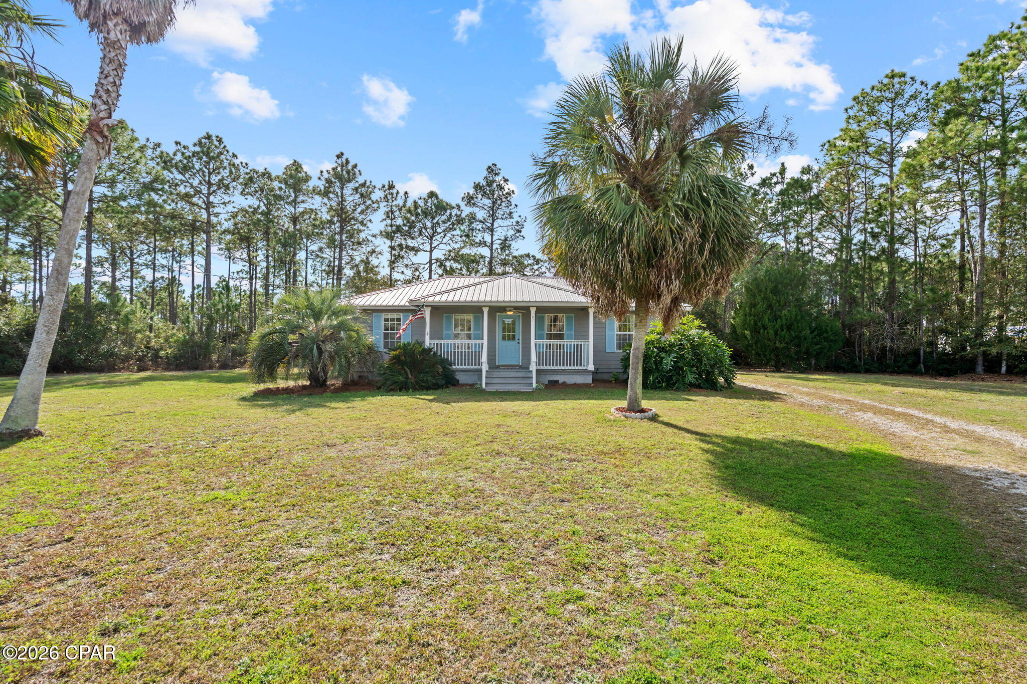 BACK ON MARKET DUE TO NO FAULT OF SELLER.  THIS BEAUTIFUL COASTAL COTTAGE ON AN LARGE, ALMOST 3/4 ACRE LOT. FEATURING 3 BEDROOMS AND 2 BATHS, ON A VERY QUIET  CUL-DE-SAC WITH A  DETACHED CARPORT W/ STORAGE SHED. IDEALLY LOCATED JUST MINUTES FROM ST. JOE  BAY. THIS INVITING HOME HAS BEEN THOUGHTFULLY UPDATED WITH NEW LIGHTING, MODERN FIXTURES, QUARTZ COUNTERTOPS IN THE KITCHEN, AND GRANITE COUNTERTOPS IN THE BATHROOMS THIS HOME IS  PERFECT FOR FULL TIME LIVING, A VACATION GETAWAY OR INVESTMENT PROPERTY, SHORT AND LONG TERM RENTALS ARE ALLOWED. NO HOA IN THIS COMMUNITY.  ENJOY AN EASY DRIVE TO THE SUGAR SAND BEACHES OF CAPE SAN BLAS OR  TO THE CHARM, DINING,AND SHOPPING OF DOWNTOWN PORT ST JOE.  A PUBLIC BOAT RAMP AND MARINA IS LOCATED CLOSE BY, MAKING IT EASY TO ENJOY ALL THAT COASTAL LIVING HAS TO OFFER. NEW METAL ROOF IN 2022, JUST SERVICED HVAC AND SEPTIC SYSTEM. THIS PROPERTY IS TURN KEY READY. SEPTIC TANK INSPECTED AND SERVICED 1/2026