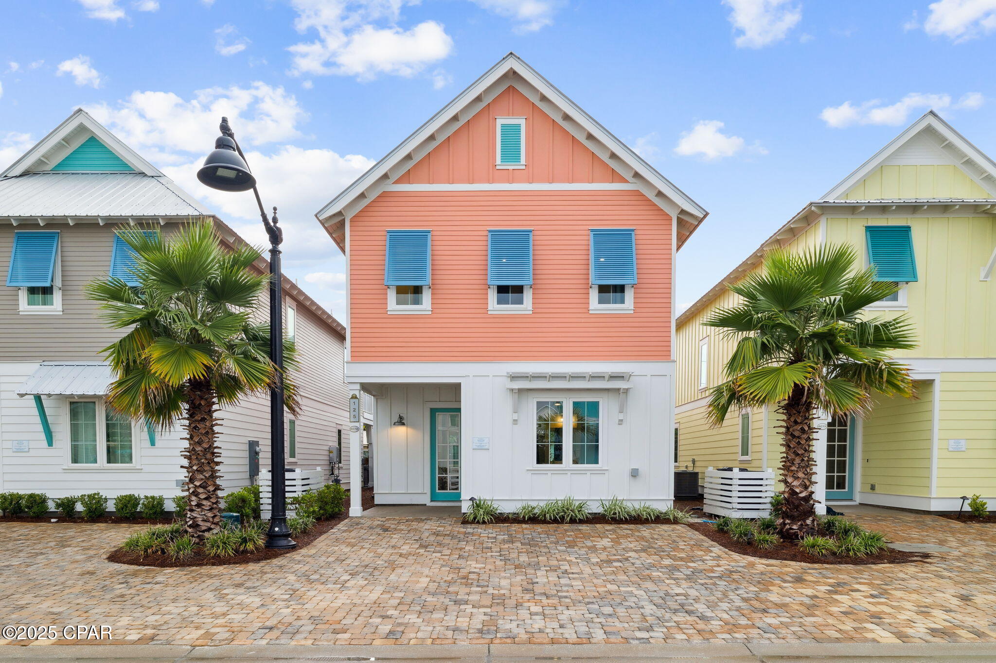 The sellers of this gorgeous like new home beach home have taken out the guesswork for what they are willing to accept and priced to sell! This opportunity will not last long. This price provides instant equity for any buyer. Situated in the heart of Margaritaville Beach Cottage Resort, this thoughtfully designed beach cottage delivers a carefree, resort-style lifestyle paired with exceptional short-term rental potential. Just steps from the community's vibrant centerpiece, The Club, owners and guests enjoy access to a resort-caliber amenity set, including an expansive oasis-style pool, towering waterslide, lazy river, and poolside bar and grill with full-service dining. A short stroll leads to 580 feet of dedicated sugar-white sand beach, where chair and umbrella service, beachside dining and the emerald waters of the Gulf. Onsite amenities included the License to Chill Restaurant, a state-of-the-art fitness center, and a family-friendly arcade. Inside, the cottage's open-concept floor plan is designed for gathering, with abundant natural light and coastal-inspired interiors that evoke a bright, playful beach aesthetic. The gourmet kitchen features a striking oversized quartz island, ideal for entertaining. The main-level primary suite opens directly to a private six-person hot tub, offering a peaceful retreat after a day at the beach. Thoughtfully furnished and turn-key, this home is perfectly positioned to serve as a personal getaway or high-performing rental, blending relaxed luxury with long-term investment value.