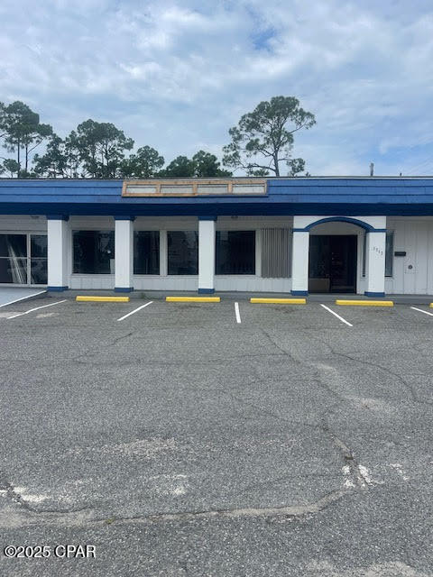 Absolutely great location on the popular Thomas Drive. New roof July 30, 2021.
3 units right across from the Navy base. Anything would be a money maker here.. Property has 3 freestanding buildings compromised  of 2 offices and a huge warehouse that is 2880 sq feet climate-controlled built in 2008 with 19' peak, 12' eaves and 14' roll up door, sprayed in insulation and foundation is plumbed for a restroom. This is rented for $2500.00 a month. Building A is 2760 sq feet with an open concept workspace with multiple entries and a restroom. Building B is approximately 1020 sq feet office space. Building B is rented for $2500.00 a month on a 3 year lease. There are also 4 other storage buildings on the property.