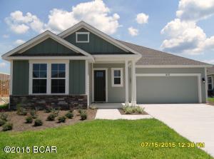 Beautiful new construction home in Whisper Dunes Phase 2B. This home features an Amberjack I floor plan with a Coastal elevation. A Samuel Taylor built home includes standard features such as designer carpet in main areas and bedrooms, 8 ft. 2 panel craftsman interior door package, brushed nickel fixtures and faucets throughout, insulated (R19) interior common walls and insulated (R38) ceilings, and durable Sherwin Williams premium interior wall paint. Kitchen features stainless steel appliance package (range, dishwasher, & microwave) and oversized 36'' wood cabinetry with crown molding, and granite counter tops. Full bathrooms include raised vanity heights, large tile flooring in bathrooms and laundry rooms, 2 x 6 Exterior Wall Construction, and hurricane tie down rod anchor