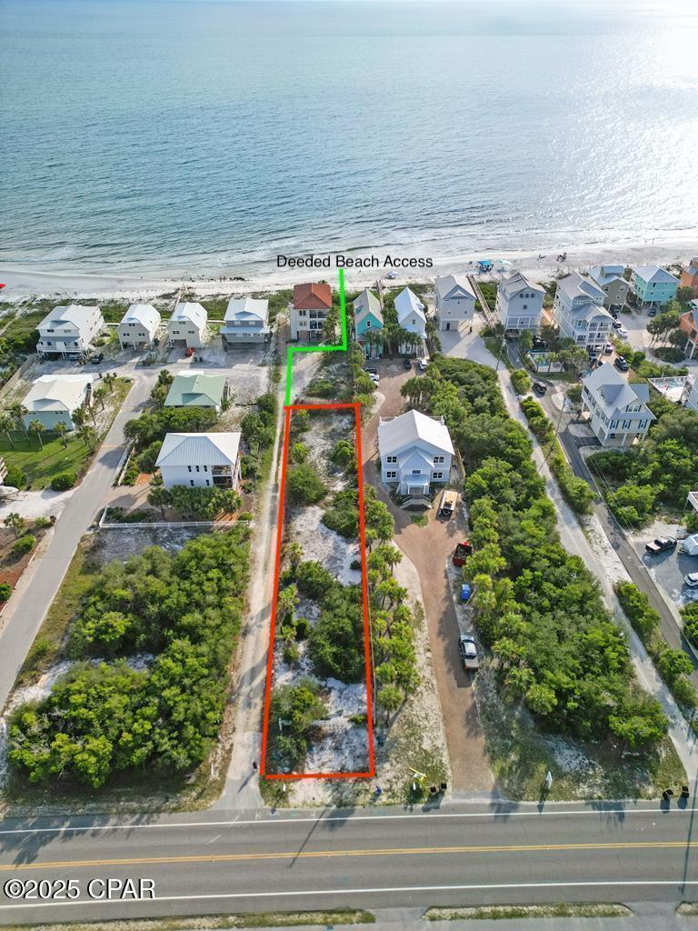 Build sooner and enjoy more on North Cape San Blas with this rare, build-ready homesite featuring both Gulf and Bay views. This quarter-acre lot offers the coastal advantages buyers want most: deeded semi-private beach access shared with only one neighbor, no HOA, desirable X flood zone location, and placement north of the CCCL line--meaning fewer permitting hurdles and a faster path to building. Water meter, paid tap fee, recent survey, and custom house plans are already in place, saving time and thousands in upfront costs. Just a short walk to the beach and Scallop Cove, with easy access to T.H. Stone Memorial St. Joseph Peninsula State Park and Rish Park.  This is a standout opportunity to create your ideal coastal retreat in one of the Cape's most desirable areas.