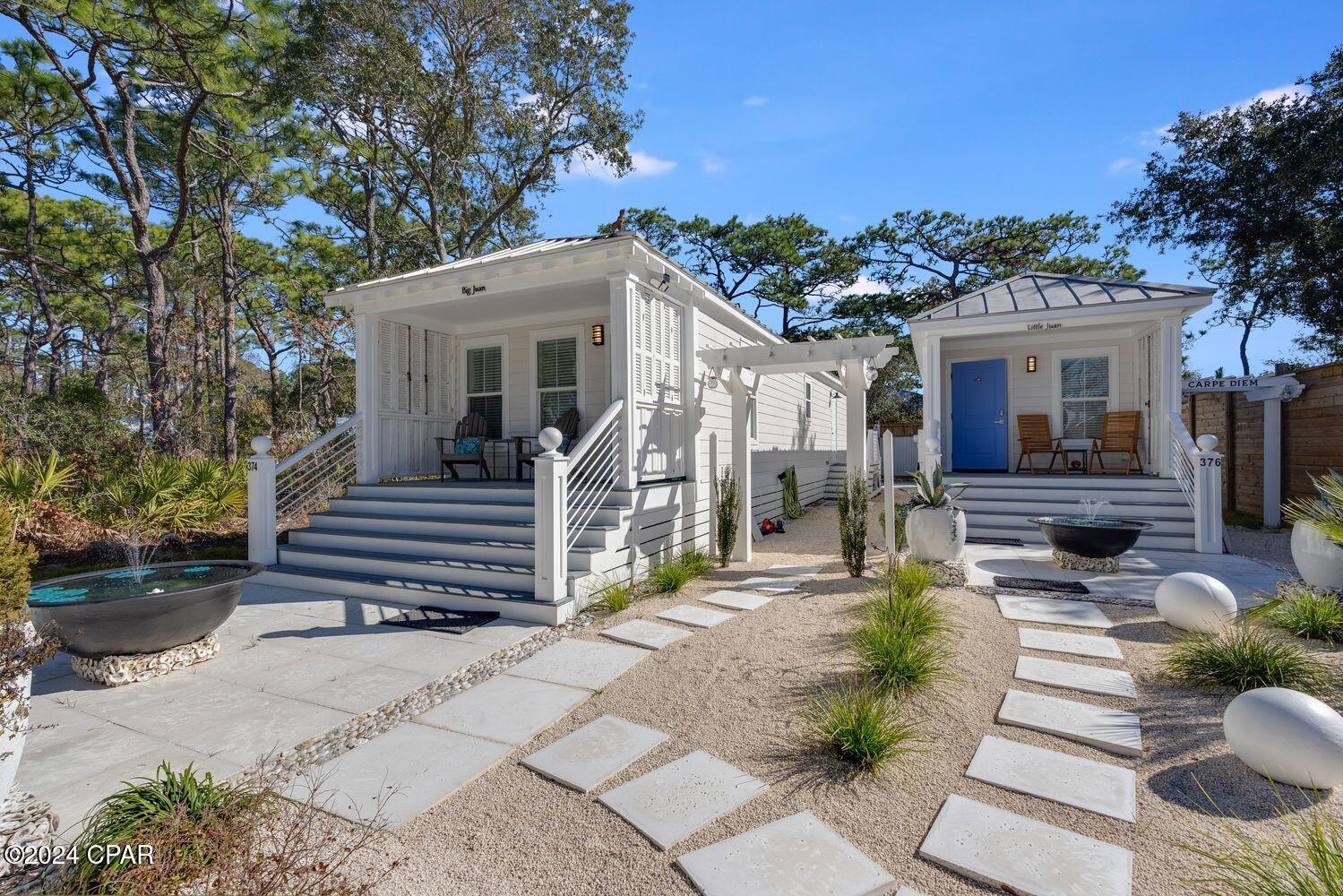***SELLER FINANCING AVAILABLE - See Agent Remarks for terms ***
Welcome to the Cottages on San Juan, located in the coveted heart of Seagrove Beach . Perfectly positioned just steps away from the local beach access and turquoise waters of the Gulf, this unique offering includes a spacious main cottage, Big Juan and a perfect, quaint home, Little Juan - ideal for multi-generational living, rental income, or hosting guests.

Big Juan offers spacious living with two bedrooms, 1 bathroom, and an open-concept design, making it ideal for both entertaining and relaxing. Modern finishes, beach-inspired décor, and abundant natural light create a serene and inviting coastal atmosphere. The gourmet kitchen is a chef's dream, featuring stainless steel appliances, ample counter space, and custom cabinetry.

Little Juan is a fully equipped guest retreat that offers both charm and versatility. This creative designed space includes a well-appointed kitchen, a cozy living area, a spacious bedroom, and a full bathroom, providing all the comforts of home. Perfectly suited for extended family or visiting guests, it also presents an excellent opportunity as a lucrative rental unit.

Nestled in the heart of 30A, this property boasts a prime location with easy access to world-class dining, boutique shopping, and a variety of outdoor activities. Enjoy front porch coffee in the mornings discovering the beauty of 30A. This property is perfectly suited as a primary residence, a luxurious vacation home, or a smart investment opportunity. Don't miss your chance to own this incredible beachside property that combines luxury living with income-generating potential. Schedule your private tour today and start living the 30A lifestyle you've always dreamed of!