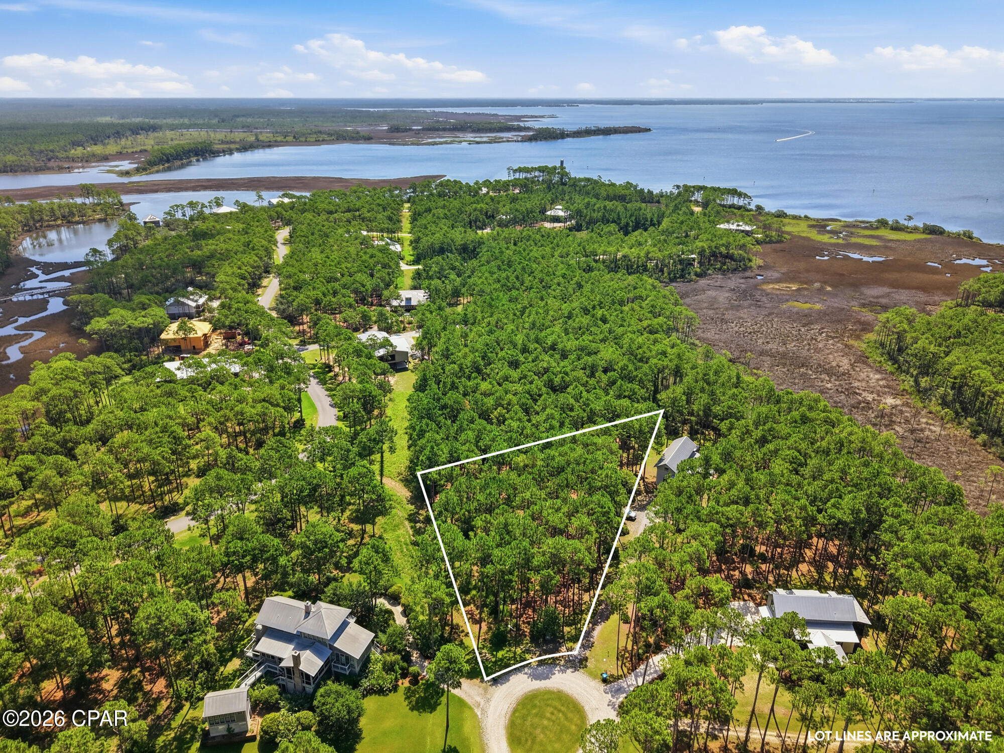 Build your dream home at 6502 Golden Aster Trail in the prestigious gated community of RiverCamps on Crooked Creek, one of Panama City Beach's most sought-after luxury nature preserves. This premium homesite offers the rare opportunity to design a custom home surrounded by thousands of acres of protected natural beauty, with Crooked Creek, West Bay, and the Intracoastal Waterway creating an unmatched coastal lifestyle. Residents enjoy exclusive amenities including the RiverHouse with a resort-style pool, fitness center, hot tub, gathering spaces, boat ramp, day docks, and access to kayaking, paddleboarding, boating, fishing, and the Gulf of Mexico. Explore more than seven miles of scenic boardwalks and nature trails while enjoying a community known for its incredible wildlife and over 100 species of resident and migratory birds.

Located just minutes from Northwest Florida Beaches International Airport, Pier Park, Panama City Beach, and the area's world-famous sugar-white beaches, RiverCamps offers the perfect balance of privacy, outdoor adventure, and convenience. Whether you're searching for vacant land in Panama City Beach, a luxury homesite to build your forever home, or a peaceful coastal community with resort-style amenities, 6502 Golden Aster Trail is ready to bring your vision to life.

Call today for more information.
