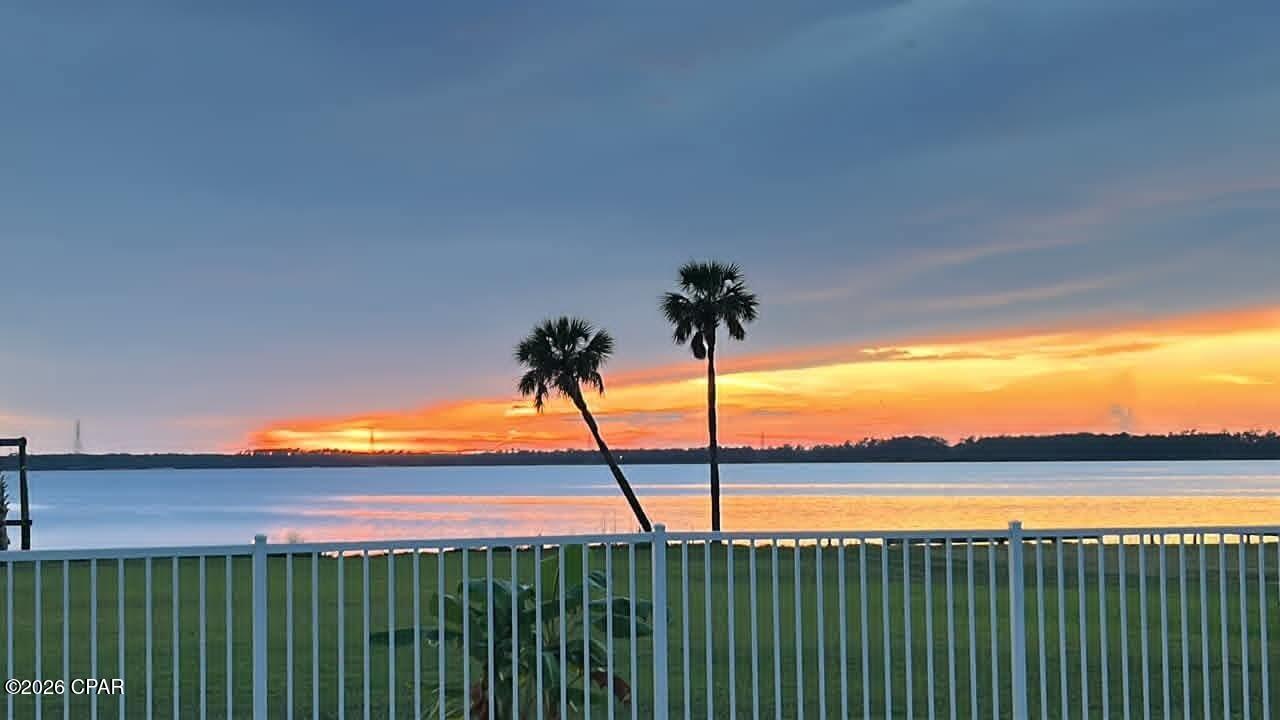 Welcome home to this North Bay-front custom resort style property. Delight in the view of the bay and spectacular sunsets from almost every room. Watch the dolphins jump while you enjoy morning coffee on the oversized 2nd or 3rd floor balconies. In addition to the balconies, there is a large covered lanai that span the entire length of the house. 
The lush landscaping, sparkling pool, custom summer kitchen and private 2 level, 2 boat-slip dock make this the perfect Florida home. The sizable lot is ideal for weddings or large get-togethers. Entertaining is a breeze with a full kitchen on the first floor in addition to the primary oversized kitchen on the second floor. If that isn't enough, there is a wet bar (second floor) and a kitchenette (third floor).  Fireplaces are in the owner's suite and the flexible area, both on second floor. The bedroom on the first floor is currently being used as a theater room. The living room on the first floor is being used as a recreational space. The possibilities are endless!!!!!
No worries about climbing stairs. The elevator is conveniently located in the front foyer. Storage is abundant. There are two double car garages, 4 garage spaces total.  Every bedroom has a large closet. There are numerous multi-purpose closets/storage rooms throughout the home. This home has a newer roof (Fall 2023).  
Ask your Realtor for a list of the recent upgrades located in the documents). They are too numerous to list here.
 You will be a hero to family and friends when you make this resort style pool/bayfront home your own.
210 Montana Ave is an adjacent property that is deeded separately. The buyer of 212 Montana Ave has the first option to purchase this home. 
The description is 1798 square feet, 4 bedrooms, 2 full baths, 2 living rooms, and a 3 car detached garage. The garage includes 2 car spaces and 1 golf cart space.  This property was fully renovated in 2020.