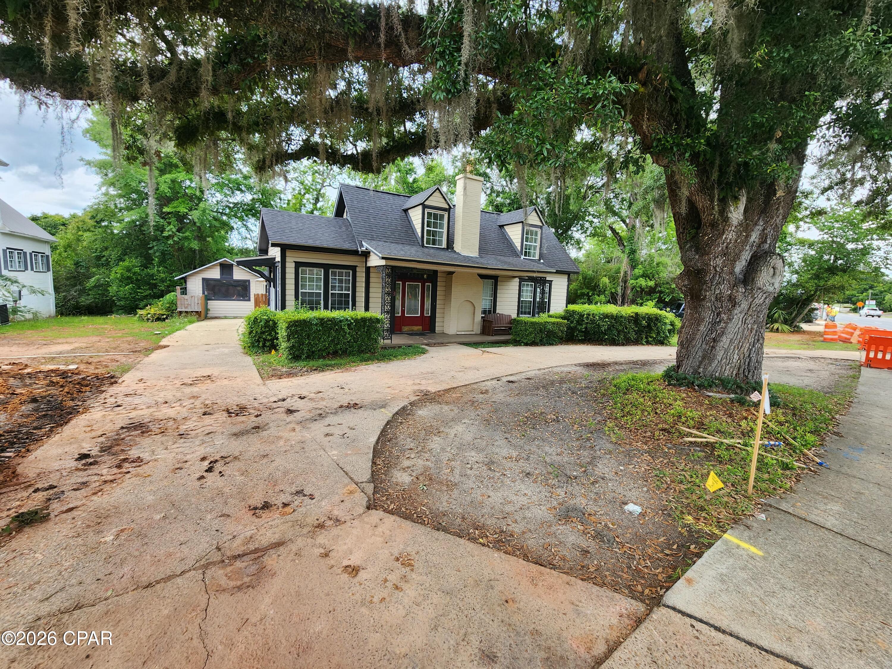 Historic Craftsman Gem in Downtown Marianna, FL!

Discover this beautiful 5-bedroom, 3-bathroom Craftsman-style home built in 1915, located right in the heart of downtown Marianna, Florida. In a growing community, this property offers a fantastic investment opportunity. Full of historic character and timeless charm, the home is priced to reflect the updates needed and presents excellent potential for a thoughtful remodel to restore its original beauty.
As you enter, you are greeted by a large living room with a cozy sitting area, followed by a spacious formal dining room ideal for entertaining and a kitchen with plenty of cabinet space. The first floor features three large bedrooms, one with its own private bathroom, plus a versatile office that can easily serve as an additional bedroom. Upstairs, two long enclosed bedrooms share a large bathroom in the hallway that connects them.
Additional features include a wheelchair-accessible ramp, a converted garage for ample storage, and a large wooden deck overlooking a secluded, shady backyard--perfect for enjoying morning coffee or watching the local wildlife in the afternoons.
Situated on busy Highway 90 with excellent visibility and accessibility, this property benefits from a prime location. Marianna is home to the stunning Florida Caverns State Park and the crystal-clear Blue Springs at Merritt's Mill Pond. It is also just one hour from the world-famous white-sand beaches of Panama City Beach.
This versatile 1915 Craftsman combines historic appeal with strong income potential, making it ideal as a primary residence, bed and breakfast, Airbnb vacation rental, or commercial office space in a growing market. A rare opportunity to restore and profit from a classic downtown property.
Contact us today to schedule a private showing!