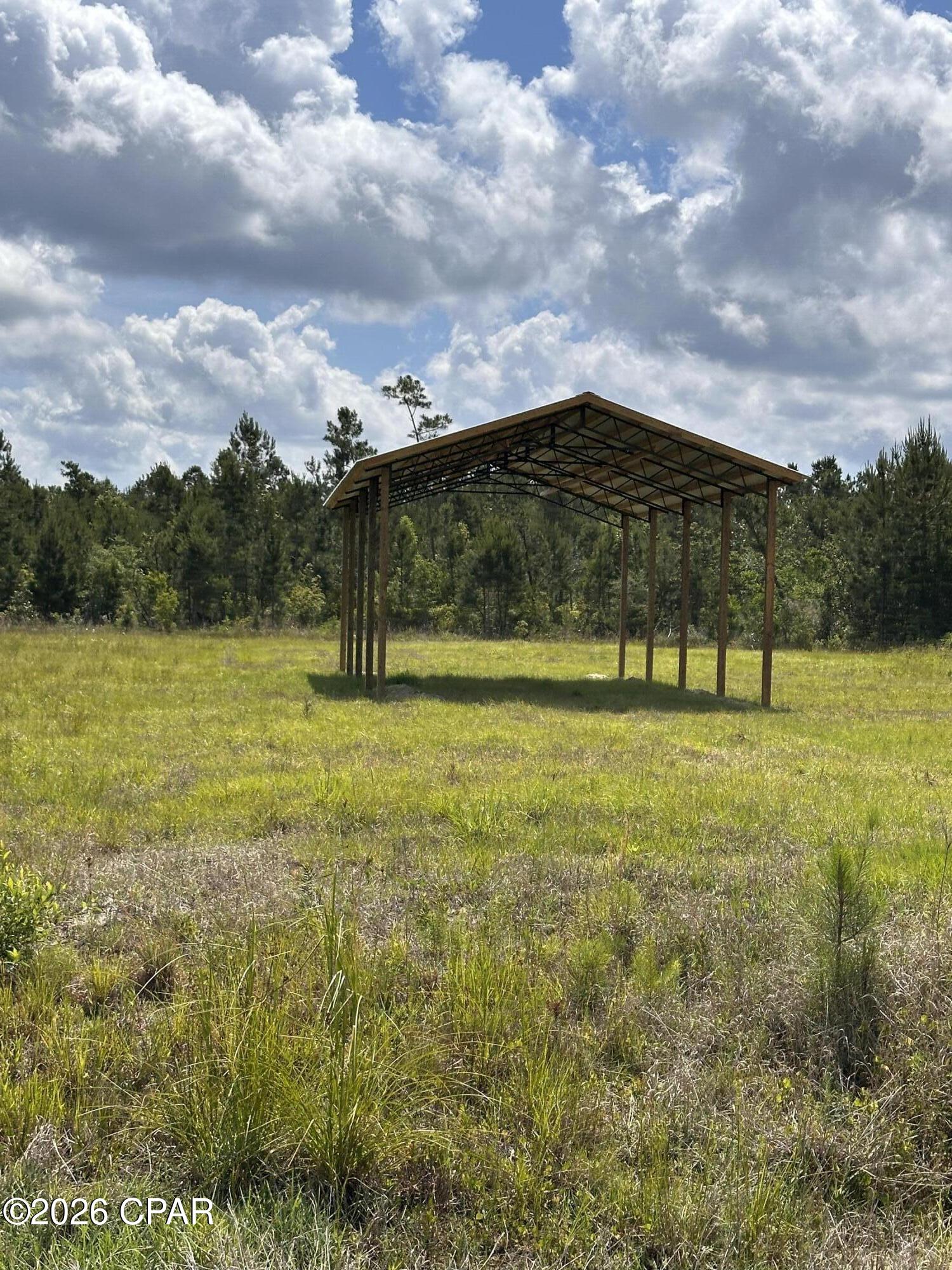 Discover this beautiful  lot on the scenic Jarrett Daniels Highway. Property has a new 24x48 Pole Barn. With 65 loads of dirt already in place, bladed, and build ready, the groundwork is done and waiting for your vision. Just minutes from Mexico Beach, local creeks and the Intracoastal Waterway, this location offers the perfect balance of country living and coastal convenience. Whether you're dreaming of a camp getaway or building your forever home, this property is a fantastic opportunity. Great location, there's not a lot of property that comes available in this area. Don't miss it. Call today!