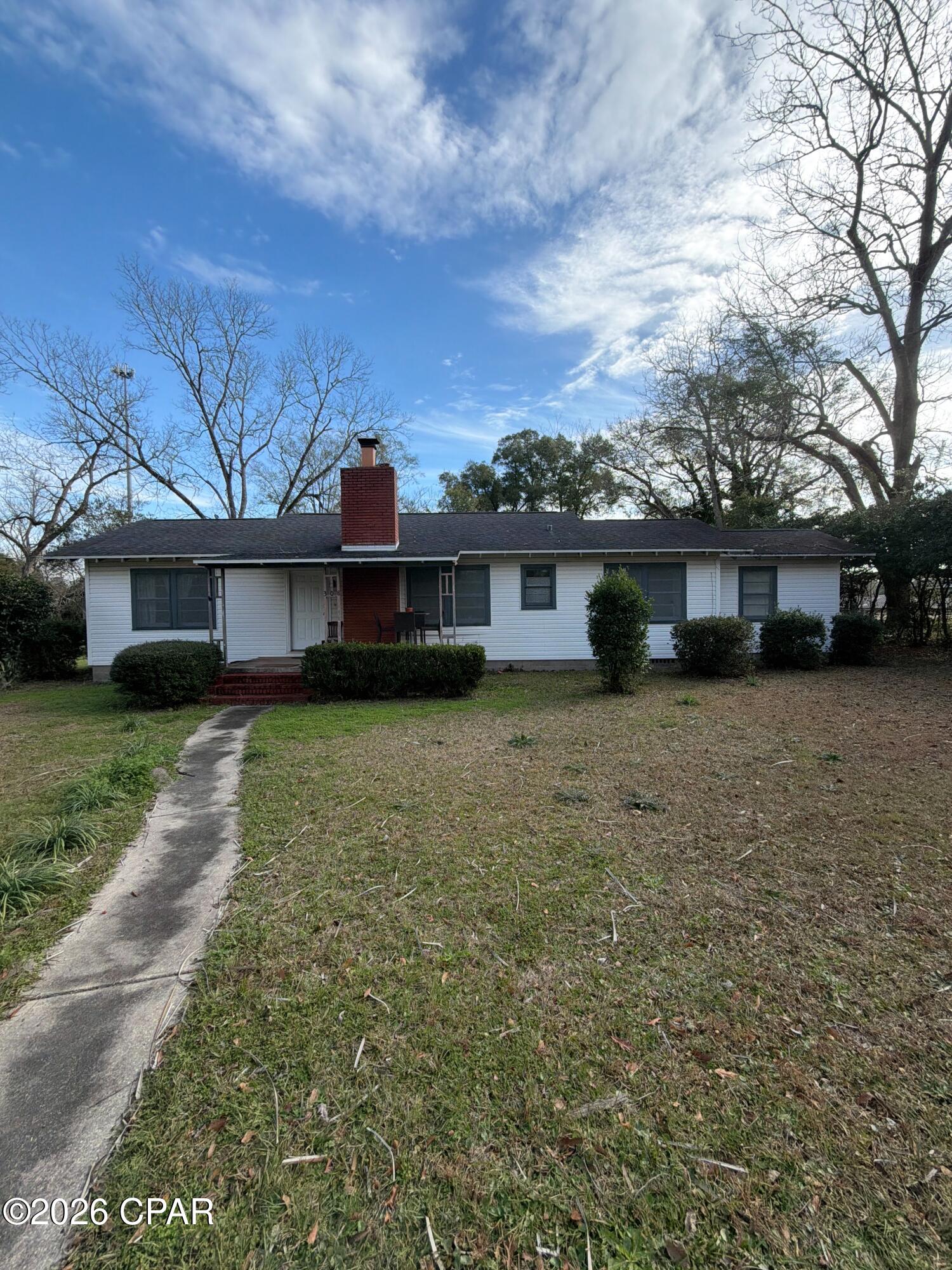 This charming 3-bedroom, 1-bath home in the heart of Bonifay, Florida, offers the perfect blend of small-town peace and everyday convenience. Nestled on a quiet, paved city street, it sits in a low-risk flood area, with the added peace of mind from the new retention pond built down the street to help manage drainage even better during heavy rains. Inside, you'll love the elegant built-in China cabinets in the dining room, adding a touch of timeless character. Step outside to a nice-sized backyard with a fenced yard for privacy and play, shaded by mature fig trees and vibrant flowering bushes that bring natural beauty year-round. The detached two-car carport provides plenty of covered parking and extra storage. Best of all, you're right in town for easy access to local amenities, yet just a scenic 45-minute drive from the world's most beautiful beaches in Panama City Beach—perfect for weekend getaways to white sand and turquoise waters.
This cozy home truly captures the relaxed, welcoming spirit of Bonifay while offering practical features and a great location!