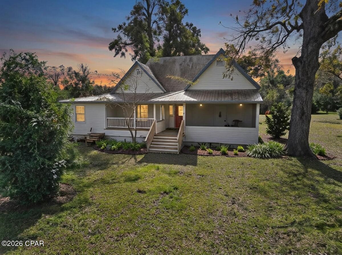 If you're looking for authentic farmhouse charm - this is it!
Nestled on a beautiful 1± acre lot in the heart of Greenwood, this timeless treasure offers the perfect blend of history, character, and potential. Step inside to find original hardwood floors, 10-foot ceilings, and all the vintage details that make classic farmhouses so special.

With just a few thoughtful updates, this home could easily become a showstopping retreat — a place where character meets modern comfort. From the spacious rooms to the peaceful outdoor setting, every inch of this property invites you to slow down and enjoy the beauty of country living, right in town.