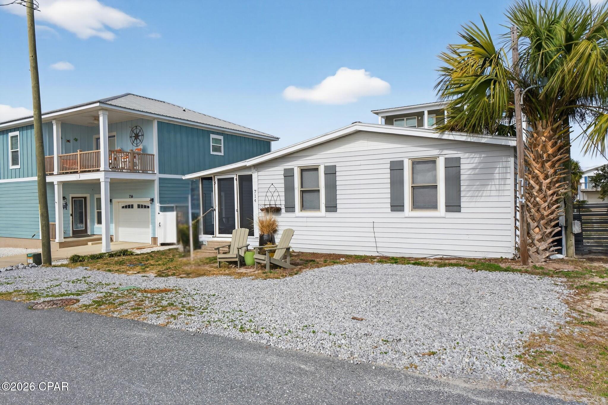 COASTAL CHARM AWAITS! Located in the heart of Mexico Beach, 714 Oleander Ave is the 1970's nostalgic coastal retreat you've been waiting for. This 3 bedroom/2 bath home is just steps from public beach access & the sugar-white sands of the Forgotten Coast, offering the perfect blend of comfort, convenience & laid-back beach living. An inviting screened porch welcomes you with the promise of slow mornings with coffee & breezy evenings after a day in the sun. Inside, the bright & open living space is designed for easy gathering. The seamless flow from the living room to the dining area & kitchen makes entertaining effortless. Coastal-inspired finishes, warm neutral tones & comfortable furnishings create a true beach getaway feel. The kitchen features ample cabinetry & generous counter space, perfect for preparing fresh Gulf seafood or hosting family & friends. The primary bedroom offers a peaceful retreat with natural light & soothing coastal vibes, while two additional bedrooms provide flexibility for guests, a home office, or bunk space. Enjoy a short stroll to the beach--no need to load the car. Spend your days walking the shoreline, fishing, paddleboarding, boating, shelling, or soaking in unforgettable Gulf sunsets. Mexico Beach is known for its small-town charm, uncrowded beaches & welcoming community. Dine at local seafood restaurants, explore nearby Port St. Joe & Cape San Blas, or visit St. Joseph Peninsula State Park for hiking, biking & pristine shoreline. It's a place where time slows down, neighbors wave hello & nature takes center stage--true Old Florida living. Whether you're searching for a primary home, vacation escape, or investment opportunity, this coastal gem delivers location, lifestyle & charm.  Call for your private tour & LIVE THE BEACH LIFE!
