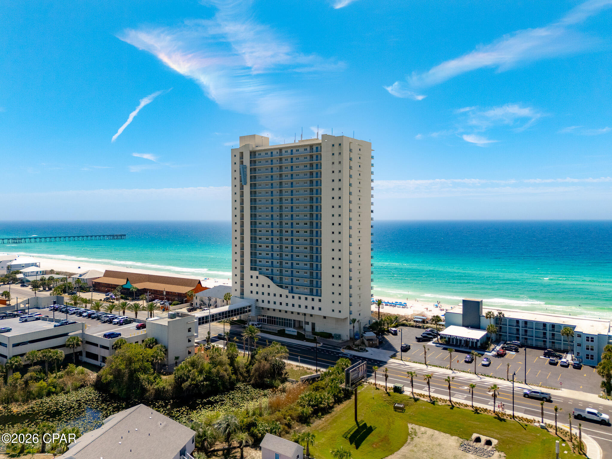 Welcome to an exceptional 23rd-floor residence offering an elevated standard of coastal luxury and sweeping, unobstructed views that truly captivate. This impeccably maintained 3-bedroom, 3-bathroom condo showcases a rare and highly desirable lockout floor plan. Designed with a private kitchenette and separate balcony, ideal for hosting guests in style, maximizing rental potential, or enjoying added privacy and flexibility.

From the moment you enter, you're greeted by an open, airy layout, refined finishes, and expansive windows that frame the stunning scenery from nearly every angle. Beyond the residence, indulge in resort-style amenities including a massive pool and relaxing hot tub, creating the perfect setting to unwind or entertain while soaking in the coastal ambiance.

Whether you're seeking a beautiful primary residence, an upscale vacation retreat, or a high-performing investment property, this extraordinary condo delivers on every level. This stunning residence is being offered fully furnished for a seamless, turnkey experience. Come see these breathtaking views for yourself!