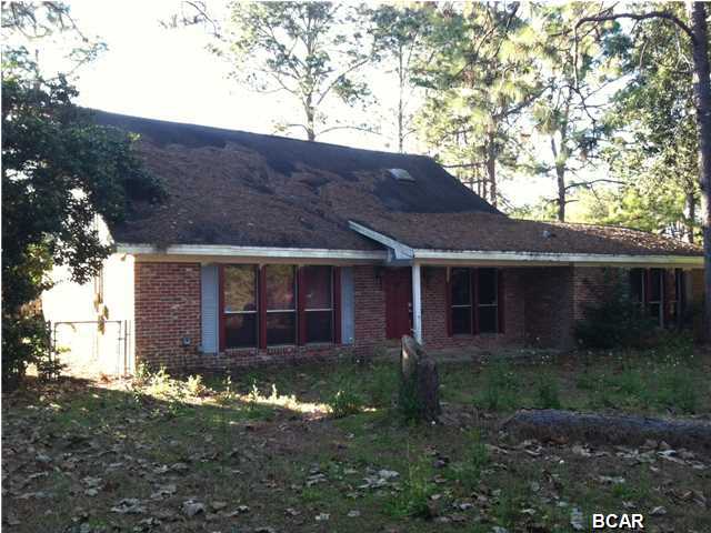 Over 2000 square feet in the heart of Panama City with a pool, this house checks all those boxes off and at a good price. This property oozes potential with its large corner lot. Large rooms and walk in attic will do wonders for your storage needs. Kitchen and Dining room are accented by a beautiful exposed brick wall, with double sliding glass doors leading to the in ground hot tub and pool. Well and Septic tank look to have been replaced in 2008, don't miss this one. Call today and return this property to its former glory. All information is to the best of our knowledge and should be confirmed for accuracy. JP Morgan Chase Bank, its affiliates or subsidiaries are strictly prohibited from directly or indirectly purchasing any property owned by JP Morgan Chase Bank. Home needs work.