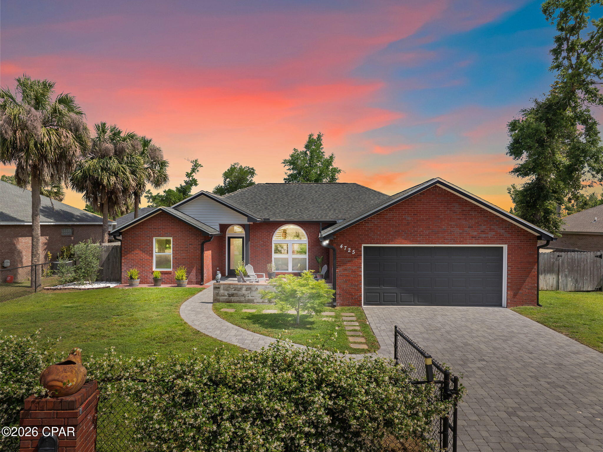 Welcome to 4725 Halcyon Dr. -- a beautiful three-bedroom, two-bath all-brick home tucked away on a quiet street, just a short walk from the boat landing at Deer Point Lake. Fully renovated down to the studs in 2019, this home feels brand new, featuring all-new upgrades including a 30-year dimensional shingle roof, insulation, sheetrock, flooring, HVAC system, hot water heater, windows, kitchen and appliances, sleek black gutters, plumbing and lighting fixtures, and fresh paint throughout.

As you step through the private front gate, you'll be greeted by the fragrant Jasmine Evergreen climbing the fence, adding charm and character to the property. The spacious paver driveway leads to a two-car garage. Inside, you'll find luxury vinyl plank flooring throughout and a modern kitchen that boasts soft-close cabinetry, floating shelves, white subway tile backsplash, quartz countertops, and high-end appliances--including a white refrigerator less than a year old.

The living room features a fully operational wood-burning fireplace that can also be used as an electric heat source, perfect for cozy winter evenings. The primary bedroom is bright and generously sized, offering serene views of the private backyard. The primary bath includes a double vanity and a walk-in closet. With a split floor plan, both bathrooms have been completely updated with matching quartz countertops and custom cabinetry.

Step outside to a large screened and covered back porch, a fully fenced backyard for ultimate privacy. With no HOA, you're free to park your RV or boat on-site. Located in Flood Zone X, flood insurance is not required.

This home is the perfect blend of comfort, privacy, and modern living--schedule your private showing today.