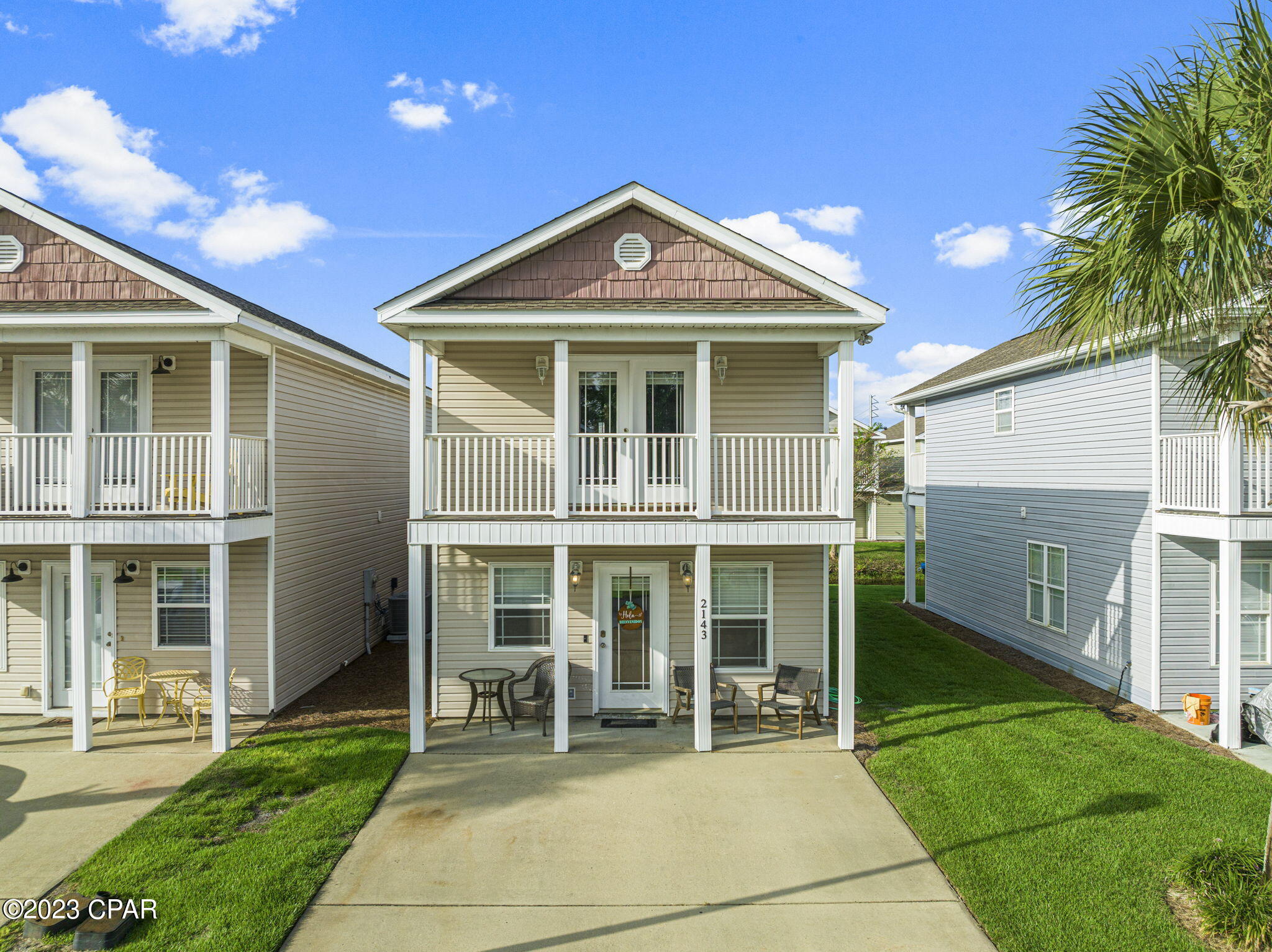 Location, Location, Location!!! For rent long term (one year) located in Sterling Cove on Front beach road. Tucked away in this gated community a two bedroom one and a half bath home. Two bedrooms upstairs with private balconies for each bedroom. Community swimming pool. Close to Gulf Coast State College, Navy Base and the Beaches.