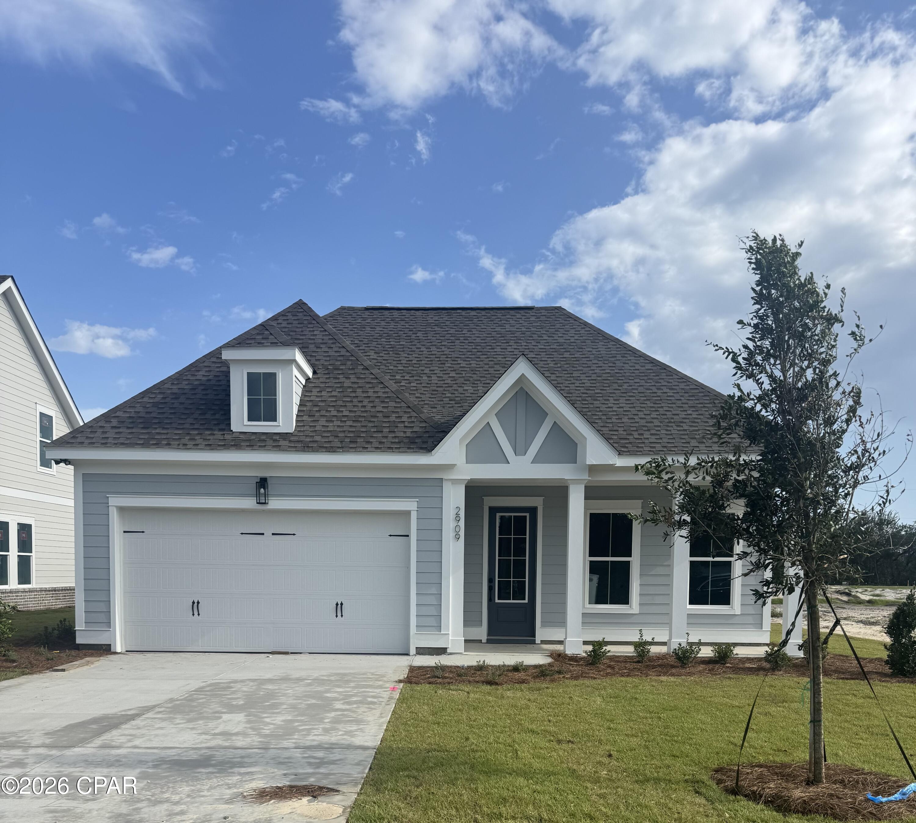 King's Landing, an exclusive new community of 39 single-family homes nestled in the desirable King's Point area of Lynn Haven's Pretty Bayou.  The stunning Stewart A plan offers 1,959 square feet of thoughtfully designed single-story living with 3 bedrooms, 2 baths and a 2 car garage. The open-concept layout seamlessly connects the modern kitchen, dining area and family room, perfect for entertaining and everyday living.  The kitchen features contemporary finishes and an island that serves as the heart of the home. The spacious owner's suite provides a private retreat with a walk-in closet and ensuite bath complete with a double vanity, shower and separate water closet.  Two additional bedrooms and a full bath provide comfortable accommodations for family and guests, while the single-story design offers effortless accessibility and low maintenance living.  
Residents will enjoy access to the community pool and cabana, perfect for relaxing and socializing with neighbors. King's Landing combines comfortable coastal living with convenient access to the water, local shopping, dining and recreation. Experience the quality craftsmanship and attention to detail that Traton Homes has delivered for 55 years.
Home will be move in ready by August!