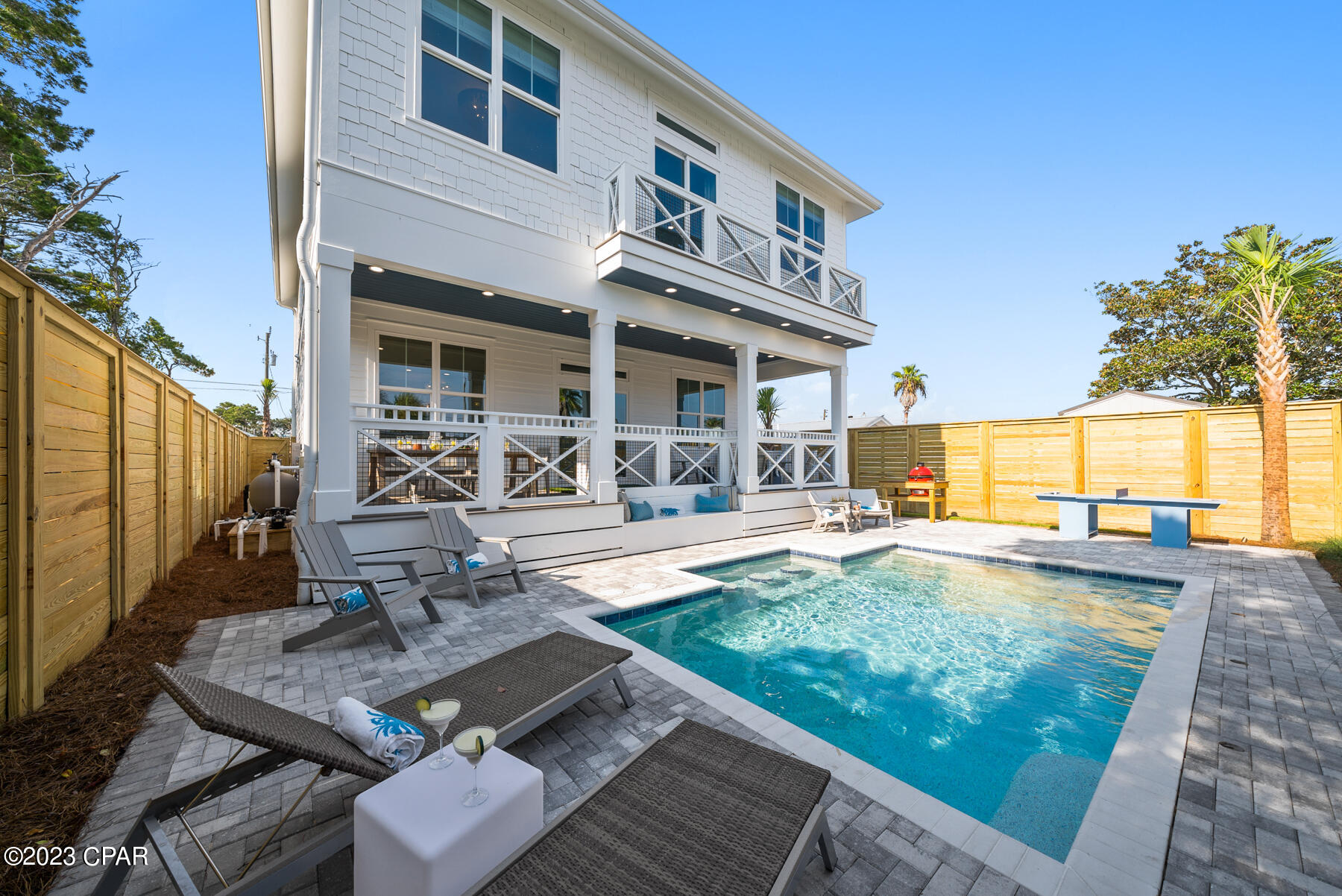 Construction Completed!! Don't miss this opportunity to embrace the coastal lifestyle you've always dreamed of in this upscale West End retreat nestled in the prestigious west end of Panama City Beach, FL. Located south of Highway 98 and within a mere half-mile stroll to the sun-kissed shores, this remarkable property offers an unrivaled coastal living experience. As you step inside this meticulously designed and fully furnished haven, luxury meets comfort. No expense has been spared in adorning this home with high-end brands such as Café Kitchen appliances and top of the line furniture from Bernhardt, Fairfield, Four Seasons, and outdoor furniture from Seaside Casual, ensuring that every detail exudes elegance and sophistication. Immerse yourself in a world of refined opulence, where quality craftsmanship and tasteful finishes combine to create an ambiance of pure indulgence. This remarkable residence offers an exceptional opportunity, whether you're seeking a lucrative vacation rental or a dream home for yourself. This stunning property seamlessly combines the allure of a high-producing vacation retreat with the comfort and charm required for everyday living.