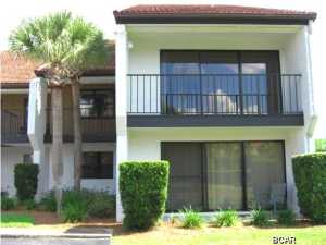 RARELY AVAILABLE CORNER UNIT FOR SALE! This immaculately maintained three bedroom / three bathroom lakefront condominium is located within one of the finest full service resorts on Panama City Beach, Edgewater Beach Resort. The unit is perfectly situated overlooking the golf course and lake with fantastic views from the master bedroom, living room, dining room and kitchen. Featuring neutral tile throughout, three full bathrooms and a split floor plan for privacy. Offered fully furnished, making it a turn-key unit - all you need to do is bring your flip flops! The large square footage and open floor plan make this unit ideal as a primary residence, second home or vacation rental property. Edgewater Resort offers tennis courts, a nine hole par three golf course, multiple swimming