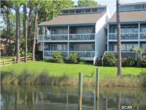 LAGOON FRONT COMPLEX. UPSTAIRS 2 BEDROOM, 2 BATH. THE UPSTAIRS BEDROOM IS A LOFT WITH A BATH. THIS UNIT FEATURES AN OPEN BALCONY WITH A WATERFRONT VIEW. WATER, SEWER, GARBAGE AND BASIC CABLE ARE INCLUDED IN THE RENT. . THIS UNIT ALSO HAS A STACKABLE WASHER/DRYER. YOU CAN FISH FROM THE DOCK AND KEEP YOUR BOAT(UP TO A 30 FOOTER) OR WAVE RUNNER ON SITE.