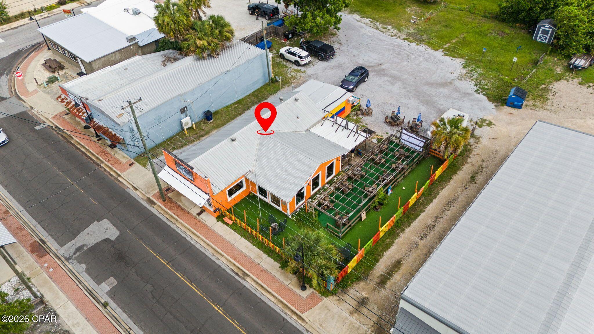 Historic Mixed-Use Commercial Opportunity in the Heart of Panama City!

Step into a piece of local history with this iconic commercial property located at 2117 E 3rd Street, Panama City, FL 32401. Originally built in 1925, this well-known landmark has been home to numerous successful businesses throughout the decades and continues to offer endless possibilities for its next owner.

Currently operating as a restaurant and drinks bar, this mixed-use zoned property features a highly functional layout with ample indoor seating, a commercial-style service area, and a one-of-a-kind outdoor gathering space designed for entertainment, fellowship, and social events. The inviting outdoor area offers a unique atmosphere rarely found in today's market, making it ideal for live music, game nights, private events, or expanded customer seating.

The building's size and footprint make it exceptionally well-suited for a variety of business ventures including a café, deli, coffee shop, brewery, wine bar, specialty restaurant, retail concept, creative workspace, or other mixed-use possibilities. Its historic charm, established presence, and strategic location provide the perfect foundation for entrepreneurs looking to bring their vision to life.

Whether you're an investor seeking a unique income-producing asset or a business owner ready to launch the concept you've always dreamed of, this property presents an incredible opportunity at an affordable price point. With its rich history, flexible zoning, distinctive character, and endless potential, this property may very well be one of the best commercial values currently available in Panama City.

Bring your vision, make your mark, and become part of the next chapter of this historic Panama City landmark