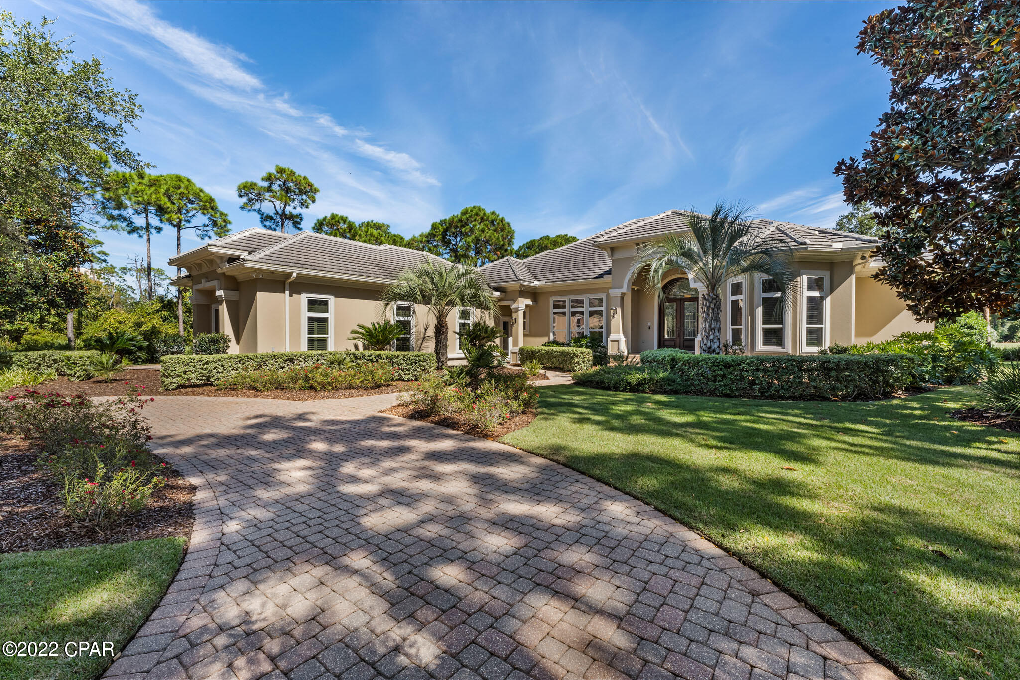 Influenced by Architecture of the Past and Inspired by Lifestyle of Today, We Welcome You to 4518 Marshbrook Way!  This Home's Location Offers Privacy & Exclusivity While Enjoying The Convenience Of Accessibility To The Owners' East Gated Entrance.  Allowing Swift Access To The Mid-Bay Bridge, Marina, Destin Commons & Less Than One Mile From Destin's Famous Beaches Of The Emerald Coast.  As You Stroll Down The Majestic Tree Lined Street You Will Find This Amazing Home Nestled Between Lush Landscaping Boosting Over ¾ Of An Acre Bordered By The 6th Fairway & Attractive Natural Foliage On Three Sides Of This Private Enclave.  Upon Entering The Home You Will Be Greeted By Grand Mahogany Doors That Lead To A Large One Story Open Floor Plan. Features Include:  3 Bedrooms, 4 Full Baths, 13ft Ceilings Throughout With High End Finishes Including Trey Ceilings & Extensive Crown Molding. Living Room With Beautiful Marble Gas Fireplace, Large Formal Dining Room, Home Office With Gorgeous Built In-Shelves & Desk.  Gourmet Kitchen With Brand New State-Of-The-Art Appliances, Double Island With Dual Sinks, Breakfast Bar, Dining Nook & Walk-In Pantry. Family Room With Built-In Entertainment Center. Owner's Suite Has Stunning Wall Of Windows, Lavish Tub, Spacious Shower, Long Vanity & Ample Closet Space. Each Additional Bedroom Has Private En-suite As Well.  Large Heated & Cooled Sunroom With Additional Dining Area & New Pool Table.  Sunroom Overlooks The Screened Lanai Featuring Recently Resurfaced Pool, Spa & Full Outdoor Kitchen Including Gas Fireplace & Multiple Covered Entertainment Areas. The Attention To Detail That Characterizes This Home Also Carries Over To Many Practical Aspects Including: Oversized Climate Controlled 3-Car Garage With Built-Ins, Professionally Finished Floors, 50 Amp Charger For Electric Or Hybrid Vehicle & A Large Newly Insulated Walk-Up Attic For Storage Or A Future Bonus Room.  In Addition, There Is Also A Separate Golf-Cart Garage/Outbuilding For Equipment Or Gardening Tools.  All Mechanical Systems Were Recently Updated With 3 New HVAC's & 2 New Hot Water Heaters.  Technology Features Include: CAT5 & CAT6 Network, Including Garage & Pool Areas, In-Ceiling Surround Speakers Throughout Living & Entertainment Areas, Full Security System With Exterior Video Camera's &  Even Exterior Receptacles Strategically Located For Holiday Decor.
If The Amenities & Features Of This Home Aren't Enough To Captivate You, Kelly Plantations Natural Beauty Is The Icing On The Cake. With More Than 900 Acres Of Splendor, Kelly Plantation's Owners Have Access To Seven Tennis Courts, More Than 50 Acres Of Parks, Recreational Areas & Walking Trails. Throw In An Olympic Size Swimming Pool, Play Ground, Owner's Club, Fitness Center, Fred Couples Signature Golf Course , Golf Club With Restaurant; Kelly Plantation Has Everything Owners Need Within Reach. Centrally Located, Kelly Plantation is Within A Minute Drive of All The Shopping, Dinning & Recreation One Could Ask For! Please Inquire For Further Details & To Schedule Your Private Showing. NO FLOOD INSURANCE REQUIRED!