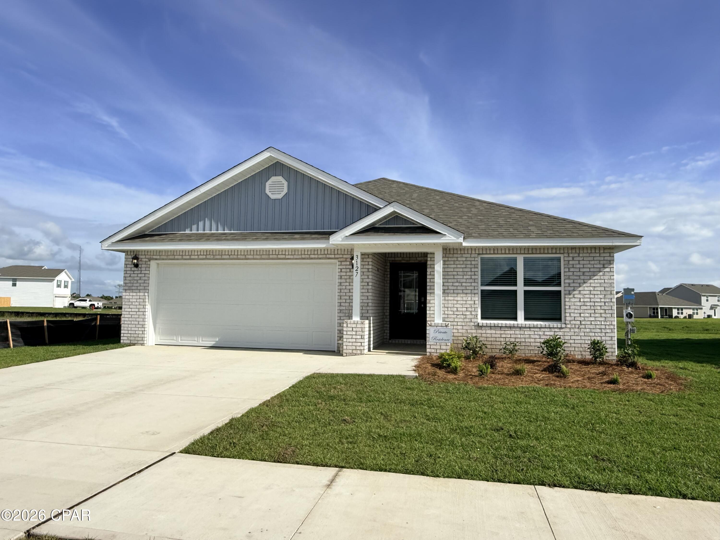 Welcome to the Aria, a new home floor plan at Hodges Bayou in Southport, Florida. This home has three bedrooms, two full bathrooms and a 2-car garage. Step inside through the covered entry where you will find a bright foyer leading into the optimized living space designed with open concept kitchen overlooking the living area, dining room, and covered back patio. You'll notice the beautiful EVP flooring throughout the home except plush carpeting in the bedrooms. The heart of this home includes the spacious kitchen that features quartz countertops, center island and a walk-in pantry with ample storage space. The living and dining areas offer a comfortable space for family and guests. Enjoy your covered patio that is accessible from the dining area that has room for a dining table or outdoor seating area.

The primary suite is located in the rear of the home creating a split floorplan that features ample space for a king-sized bedroom suite. The walk-in closet is located within the main suite and has all the space you need to get ready in the morning. The primary bathroom has a dual quartz sink vanity, a separate shower, separate soaking tub, enclosed toilet for extra privacy and linen closet. There are two additional bedrooms that has large closet spaces and share a full bath. This home also features a laundry room with space for a full-size washer and dryer. These homes come equipped with a Home is Connected® smart home technology package including QOLSYS IQ Panel, Skybell Doorbell, Kwikset Smartcode front door lock and DEAKO Smart Switches which allows you to control your home with your smart device while near or away.

The exterior of this home features a brick front exterior with vinyl siding, dimensional shingles with 30-year warranty. Each home in Hodges Bayou includes a fully sodded lawn to each property line and flower beds at front entry. Our Hodges Bayou community features underground utilities making it less susceptible to damage from severe weather leading to fewer outages and more reliable service. Sidewalks line every street so you can enjoy the unbeatable Florida sunsets and sunrises on your walk to the playground with the kids or the dogs. Whatever room in this house you're in, you will feel right at home! Contact us today to find your home at Hodges Bayou Plantation!