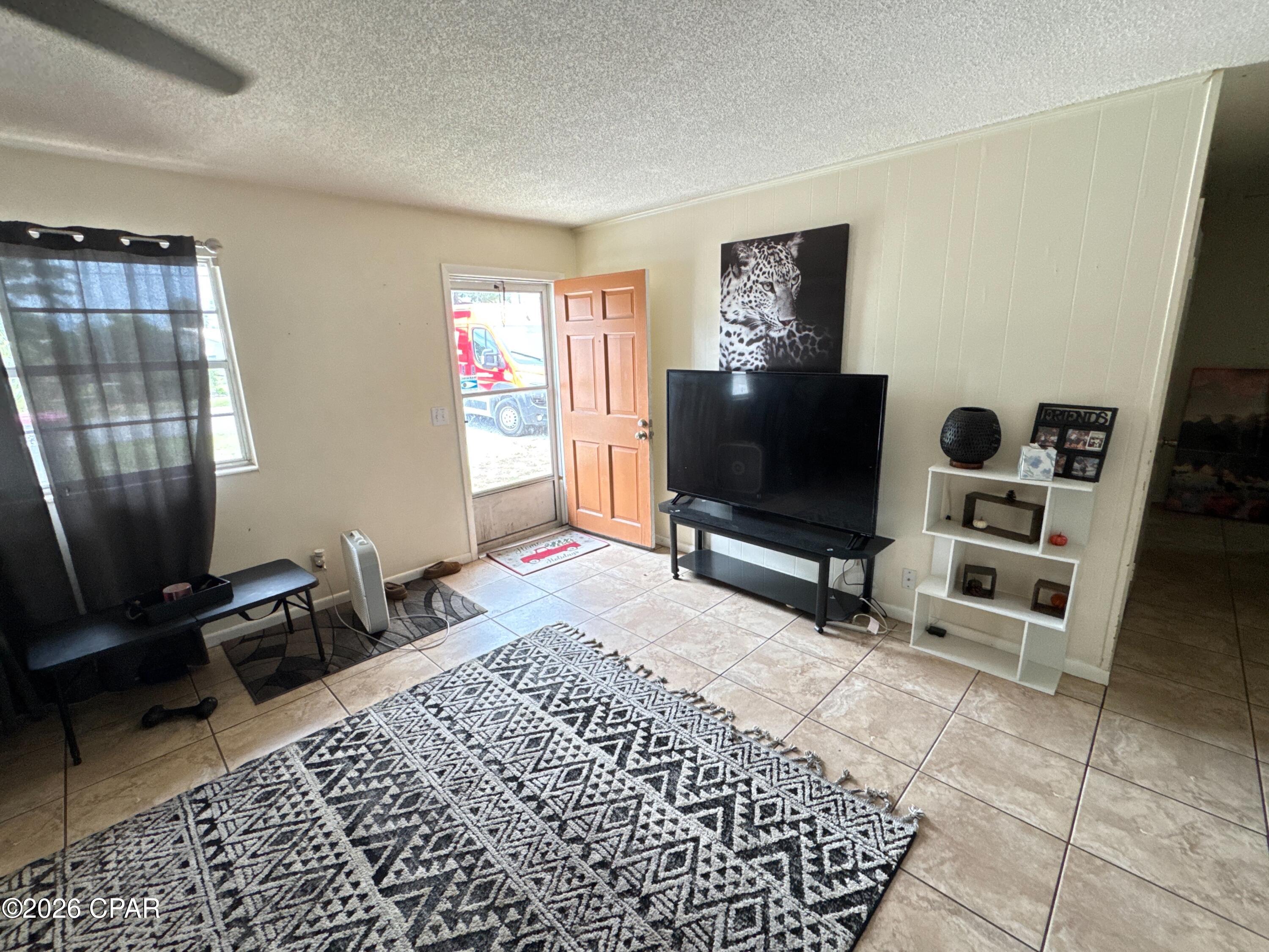 PICTURES COMING SOON.   3bd/2bth almost 1,600 sqft WITH A 2 CAR GARAGE - ONE STORY BRICK HOME.  Newer roof, 2018.  Newer septic system made with room to add another full bath if desired.  East end of Thomas Dr. area.  CLOSE TO BEACHES, COULD BE A GOOD SHORT TERM RENTAL.  Back yard is fenced and very large.  OVERSIZED LOT - 75x100.  We have a window bid in place to replace all the windows for $13,200.