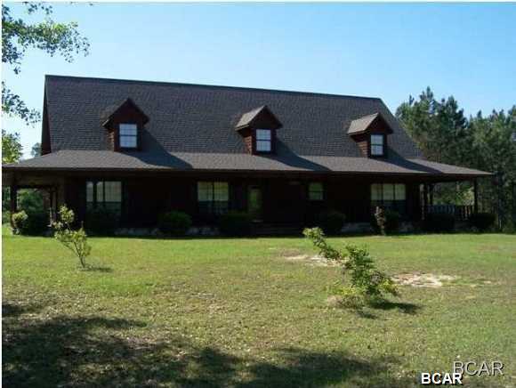 This 1999 custom built home with frontage on highway 79 is one of a kind. Home features cedar siding, huge wrap around porch, and architectural shingle roof. Inside you will find a spacious den with custom tile floor and stone fireplace. Large kitchen & dining combo with custom cabinets and hardwood floors. With 4 bedrooms downstairs and a large recreation upstairs this is truly a family home. Make your appointment to see this home soon.