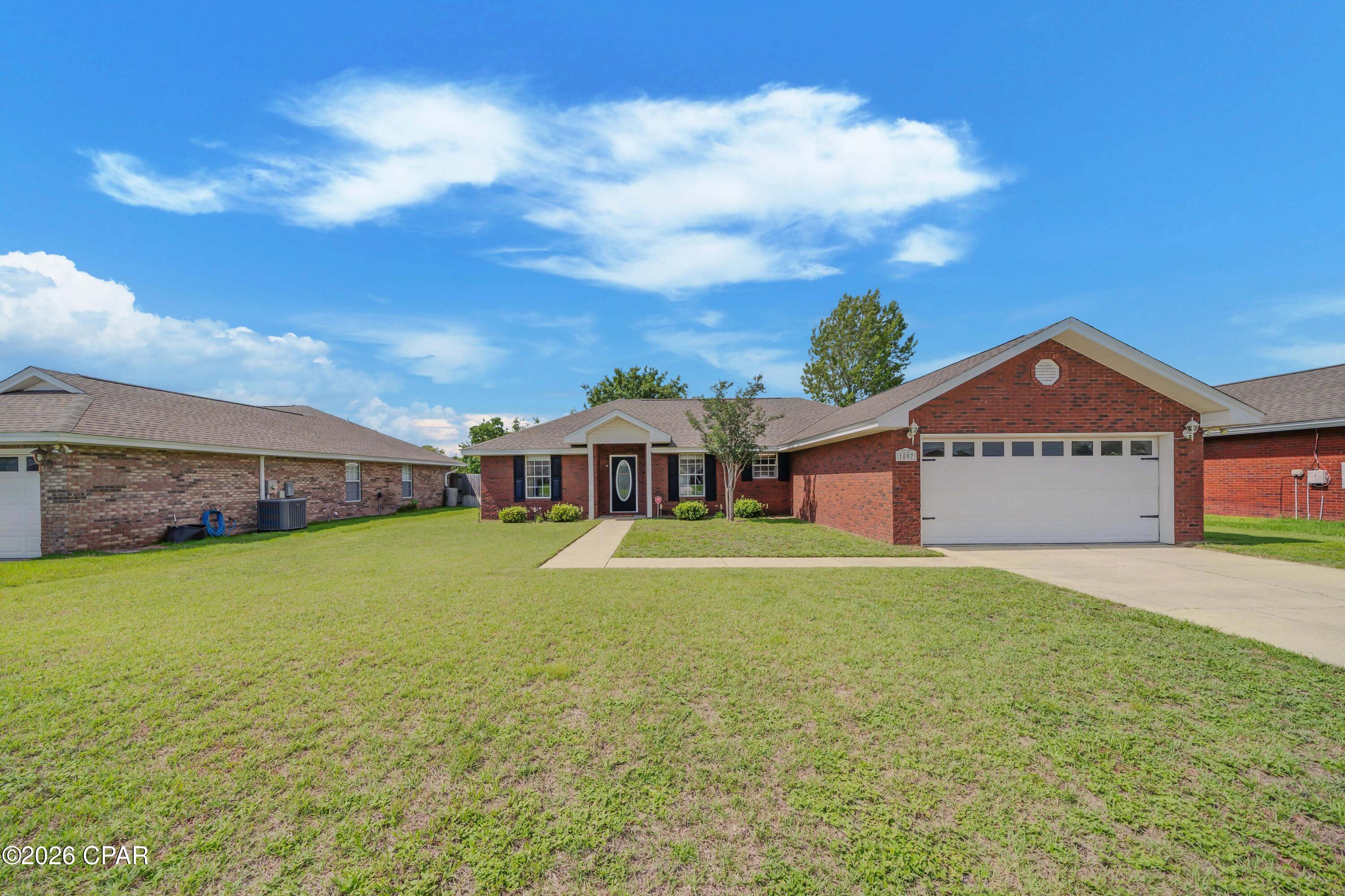 All brick home in College Point area of Lynn Haven. 3 nicely sized bedrooms and 2 full baths. Centrally located on quiet cul-de-sac close to schools, shopping, parks, recreation and within 15 miles to the World's Most Beautiful Beaches. This property has a 16x25 foot outbuilding that makes a perfect Man Cave! The outbuilding has electric with 240 volt plug and a window unit for climate control. Refrigerator, washer and dryer convey with home.