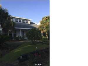 Beautiful, custom built 4 bedroom, 3.5 bath home with approximately 2,500 sq ft plus a 1 bedroom, 1 bath apartment over the detached garage. Incredible location across from the Santa Rosa Golf & Beach Club and only 5 minutes to the beautiful beaches of Dune Allen. You're going to love the bright and open floor plan with high ceilings, crown molding and 8' doors. The kitchen has lots of storage space, stainless steel appliances, quartz counter tops and is open to the dining area and huge living room with built-in cabinets and a gas fireplace. The master bedroom is on the first floor and there is an additional guest bedroom with it's own handicap equipped bath. Upstairs there are 2 large bedrooms, a full bath and a playroom/den. The back yard has a HUGE 20'x60' heated pool. Above the