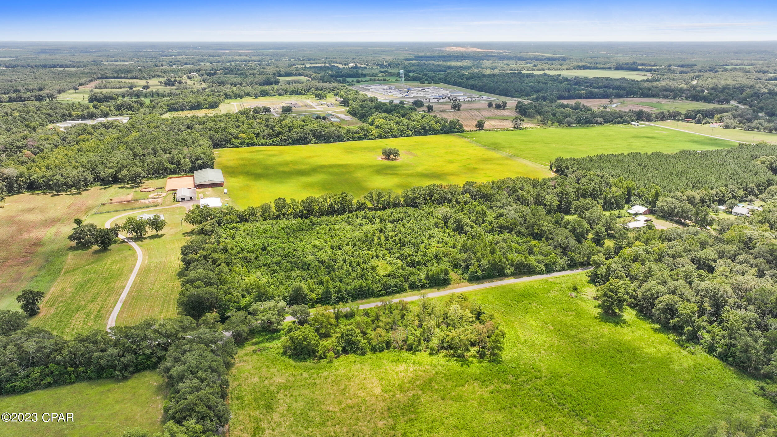 Discover your dream retreat nestled within this sprawling 10-acre woodland oasis in the heart of Graceville, FL. This remarkable property offers the perfect canvas for your vision, whether you're seeking to build a secluded getaway, an enchanting cabin, or an expansive family estate. With the potential for city water and sewer services to be extended, the possibilities are endless!  Don't miss out on this chance to own a piece of paradise! Contact us today to explore the potential of this remarkable property and take the first step toward making your woodland dreams a reality.