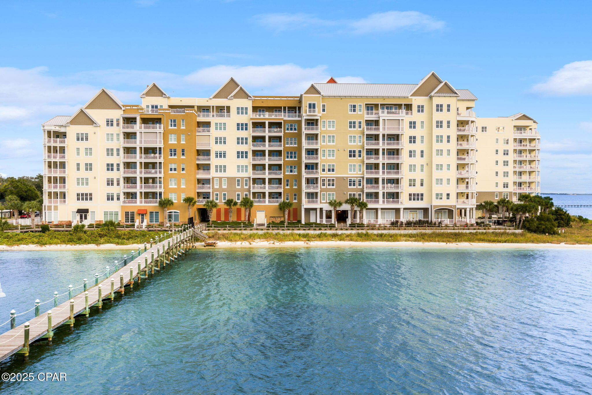 Sunset Bayfront Retreat - Updated & Move-In Ready in Gated Harbour Village

Discover peaceful waterfront living at its finest in Harbour Village, a boutique 2006-gated community of only 116 residences on the serene shores of St. Andrews Bay. This lovingly maintained 2nd-floor condo offers the perfect blend of modern comfort and timeless coastal charm in Historic St. Andrews -- a vibrant 19th-century fishing village now filled with marinas, artisan shops along Beck Avenue, and farm-to-table favorites just steps away. No short-term rentals means a true residential sanctuary year-round.

Unit 202 is all about those magical west-facing views. Step onto your private balcony -- accessible from both the living room and primary suite -- and watch breathtaking sunsets paint the bay, dolphins playing in the harbor, and boats gliding by. Thoughtfully upgraded with custom finishes and tasteful décor, this home feels warm, sophisticated, and genuinely cared for -- the kind of place that instantly feels like home.

Enjoy resort-style amenities that elevate everyday living:
• Heated waterfront pool with sweeping bay views
• State-of-the-art fitness center
• Spacious community room for gatherings
• Cozy outdoor fireplace for fireside evenings
• Private marina with deeded boat slips (none assigned to this unit)

St. Andrews living at its best: stroll to the marina, shaded boardwalks at Oaks by the Bay Park, Saturday farmers market, and local gems like Alice's on Bayview, Uncle Ernie's, and Finns. Quick access via US 98 to Panama City Beach, and everything Northwest Florida has to offer.

This cherished, family-owned condo has been meticulously maintained and is now ready for its next chapter. Motivated sellers are ready to welcome the right buyer who will love it as much as we have. Rare west-facing bay views like these don't last long in Harbour Village.

Schedule your private showing today and experience why this feels like coming home to the water.