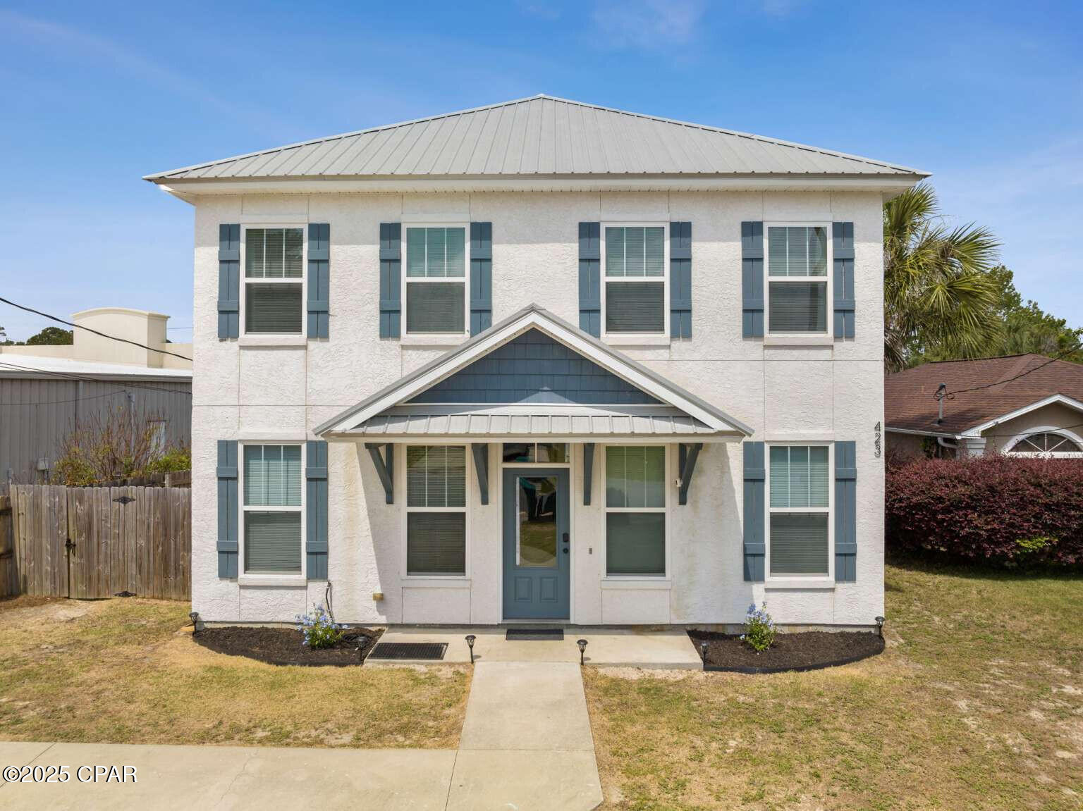 Located on the highly desirable west end of Panama City Beach near scenic 30A, this 4BR/2.5BA home offers 1,908 sq. ft. in one of the area's most sought-after rental and second-home corridors. Buyers in this market consistently value walkability to the beach, private outdoor living space, and no HOA restrictions--and this property delivers. Just five blocks to public beach access and situated in unincorporated PCB, the home provides flexibility for short-term rental, second home, or full-time residence. The fenced backyard is designed for relaxation and entertaining, featuring a private dipping pool (perfect for cooling off after beach days), park-style charcoal grill, fire pit area, and storage shed for beach gear and bikes. The neighborhood also offers direct access to Lake Powell with a boat ramp for boating, kayaking, and paddleboarding. Only 7 miles from Pier Park, you're close to dining, shopping, and entertainment while enjoying the quieter west end setting. Offered unfurnished, allowing buyers to customize or furnish to maximize rental​​‌​​​​‌​‌​​​​‌​​‌​​​​‌‌ appeal.