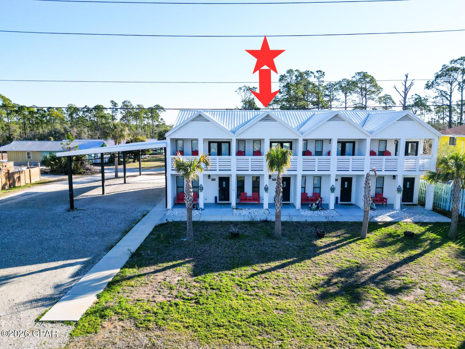 Turn key unit is part of a quadplex across the street from the Gulf of America. Each unit is a 2 bedroom 1 full and 1/2 bath with an open floor plan and gulf views. These completely furnished units have a covered front porch, second story covered deck off of a top bedroom with Gulf of America views. Need to entertain or just want extra space? There is a spacious back patio that is partitioned for privacy, large back yard, and side covered parking gives the property many options for added features or expansion versus similar beach multi unit residences. There is a recorded beach access pedestrian easement for easy beach access right across the street. Conveniently located equidistant between Port St Joe and Mexico Beach for a variety entertainment options. The subdivision is decades old and has its own ingress and egress road with no thru traffic. NO HOA!! All units are in an X flood zone per the Gulf PA website, Verify if important. Some dimensions taken from the Gulf County Property Appraiser's website, please verify if important.