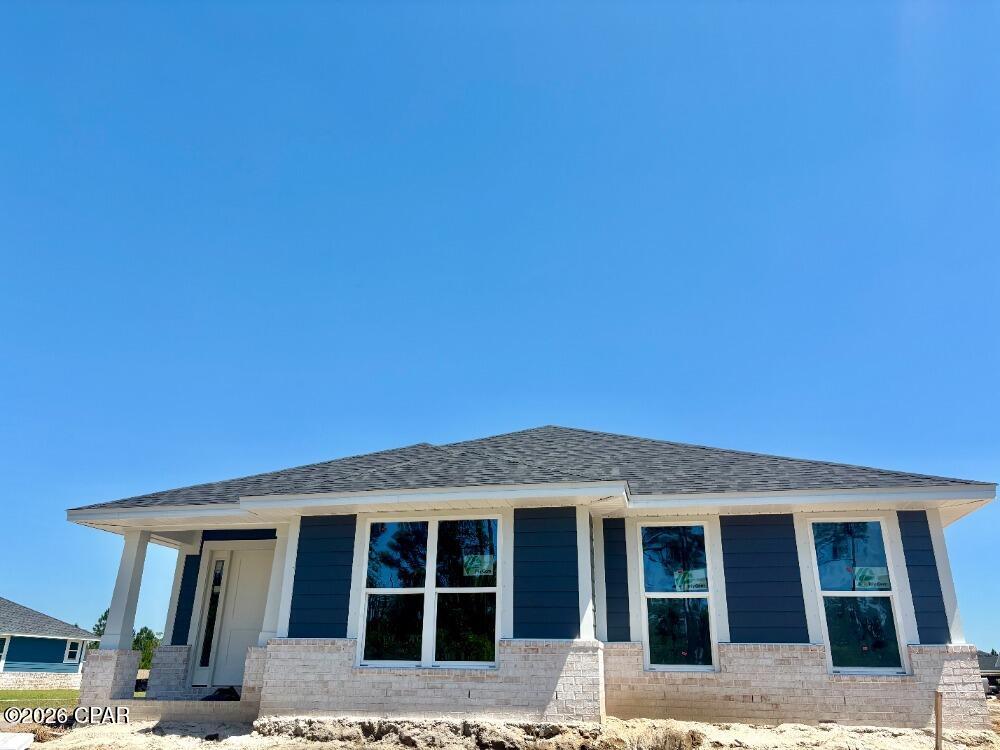 Step into 2,201 sq. ft. of modern elegance in this stunning 2026 single-story retreat. Located in a premier waterfront community with direct Bay and Gulf access, this home perfectly blends style with daily practicality. 
The heart of the home features an expansive open-concept living area and a chef-inspired kitchen, complete with granite countertops, a large island, and a walk-in pantry. Relax in the private master suite featuring a spa-like en-suite bath and a massive walk-in closet. Durable and beautiful Core Tec Pro Plus flooring flows throughout, offering 100% waterproof protection perfect for coastal living. With energy-efficient construction, a customizable flex room, and a 2-car garage, this home is designed for both comfort and long-term value.