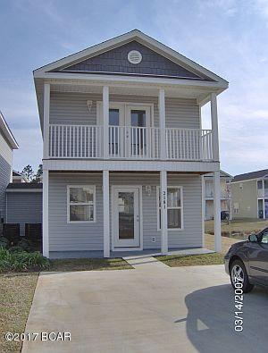 This townhome includes 2 bedroom, 1.5 baths and overlooks the pond. The downstairs has tile floors and the kitchen is light and open. Each bedroom has a private balcony overlooking the water. The complex is gated and close to the Navy base, shopping, beaches, restaurants etc. Access to the community pool. Garbage and lawn service is included!