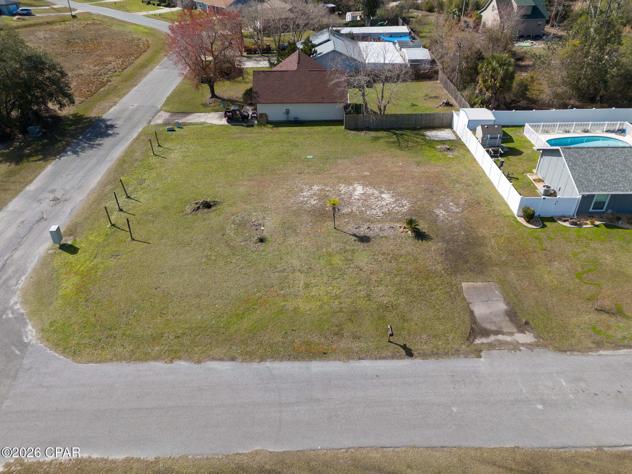 Beautiful and level corner lot with open views to the southwest to watch gorgeous sunsets from.  Quiet and peaceful neighborhood.  10 minutes to Tyndall AFB

HOA maintains roads, standards and mows grass in common areas.  HOA dues will commence as soon as State Docs are finalized.  Check out the HOA details