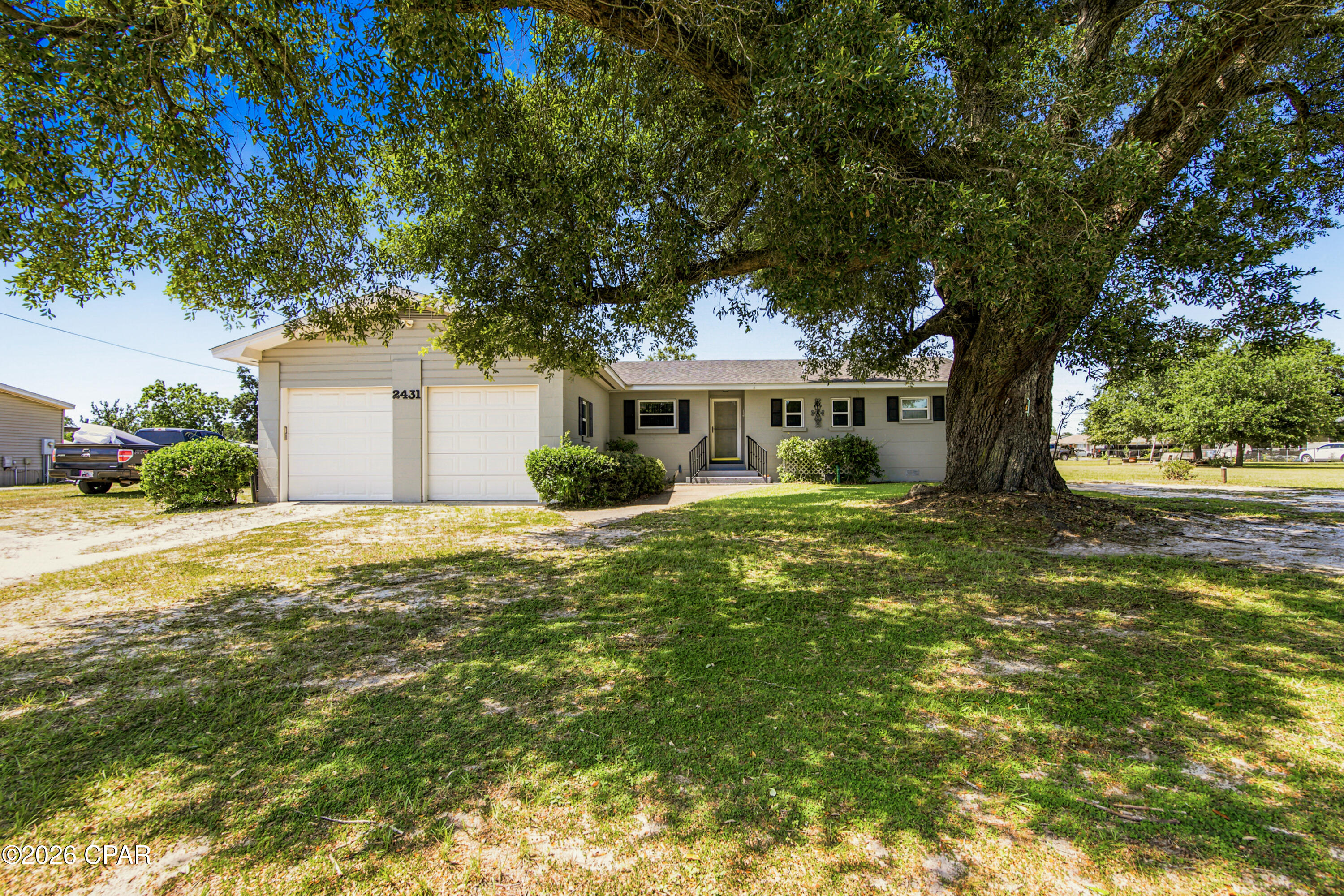 Beautifully Renovated 3-Bedroom Home with Workshop & Modern Updates
Move right into this beautifully renovated 3-bedroom, 2-bath block home offering 1,423 square feet of comfortable living space in a convenient location close to hospitals, schools, shopping, Tyndall Air Force Base, and just a short drive to the world's most beautiful beaches.
The updated kitchen is sure to impress with elegant quartz countertops, Whirlpool stainless steel appliances, and luxury vinyl plank flooring. Original oak hardwood floors add warmth and character throughout the living room and all three bedrooms.
The spacious primary suite features a private bath with a walk-in shower and quartz vanity, while the guest bath offers a tub/shower combination with updated quartz countertops.
Renovated following Hurricane Michael, the home also features replacement windows installed after the storm, providing added efficiency and peace of mind.
Step outside to enjoy the 23' x 14' uncovered concrete patio--perfect for grilling, entertaining, or relaxing. Need extra storage or workspace? The 24' x 24' workshop includes electricity, with half of the building featuring a concrete floor and the remaining area offering double-door access with a dirt floor that's ideal for storing a boat, vehicle, or lawn equipment.
Additional features include a wheelchair-accessible ramp at the rear entrance and a private well for watering the lawn. (No sprinkler system.)
If you're looking for a move-in-ready home with modern updates, character, and a fantastic location, this one is a must-see. Schedule your private showing today!